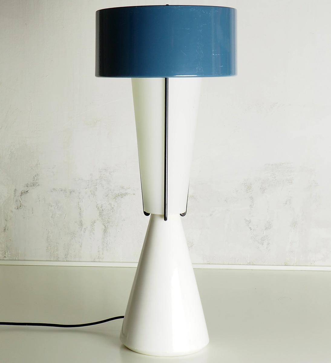 Important and large table lamp attributed to Ettore Sottsass designer. With a massive marble basement and white satin glass reflector. Original and rare design.