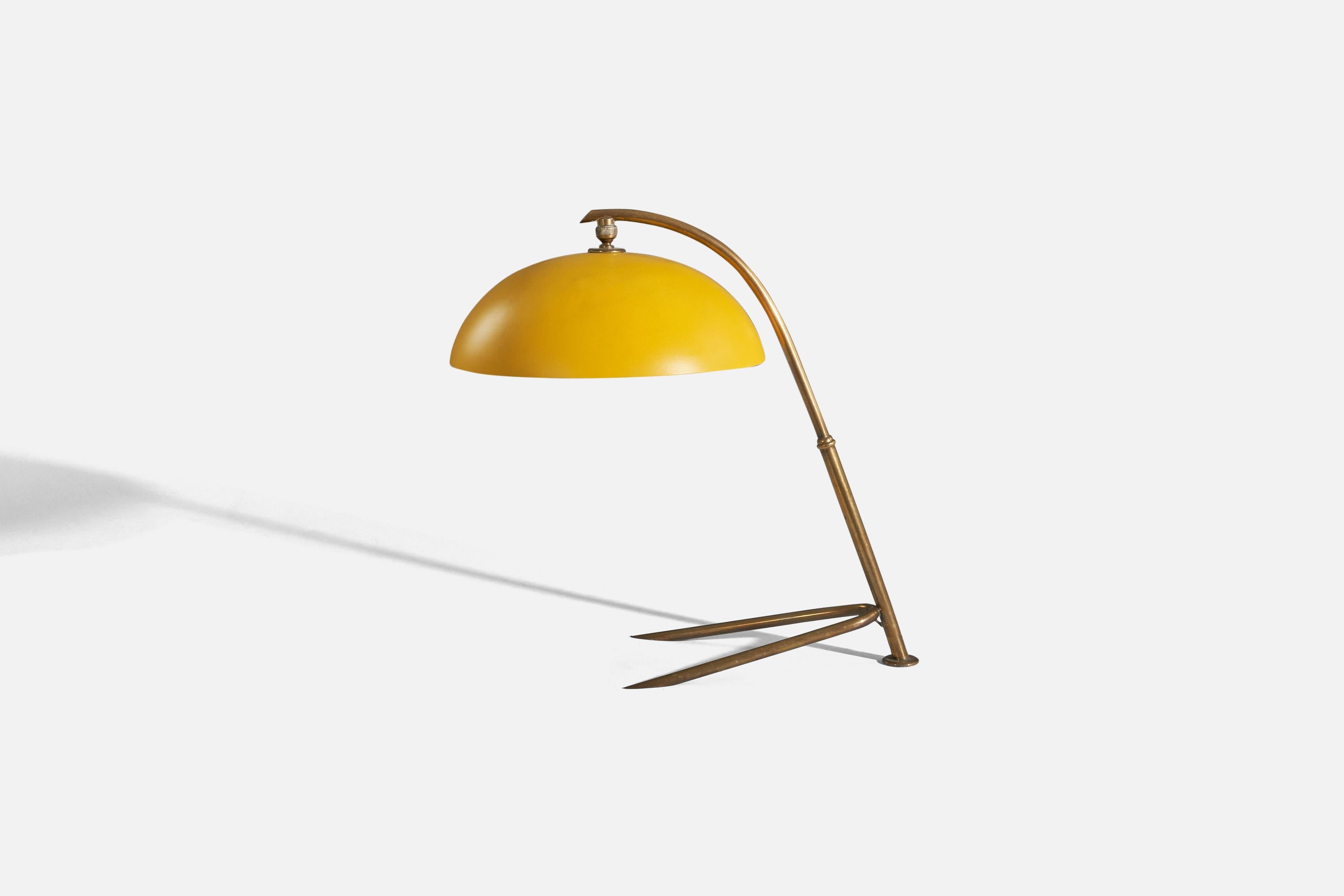 A brass and yellow-lacquered metal table lamp designed and produced by Stilnovo, Italy, 1950s.