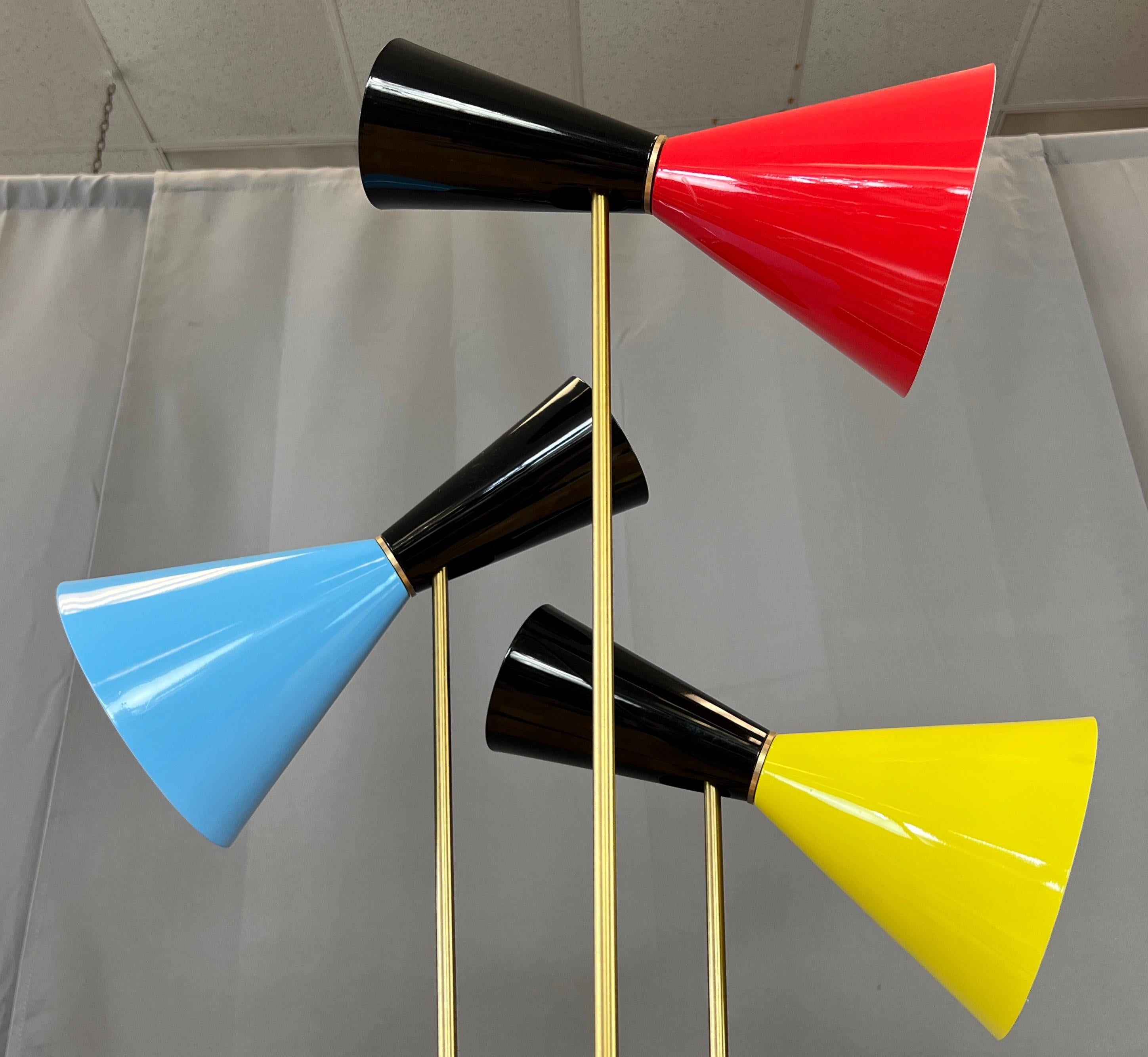 Metal Stilnovo Three-Arm Tripod Floor Lamp Shades in Sky Blue Red & Yellow