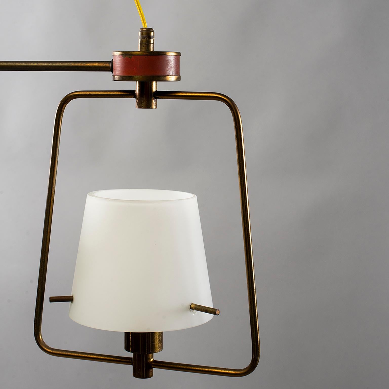 20th Century Stilnovo Three-Light Fixture with Glass Shades and Brass Fittings For Sale