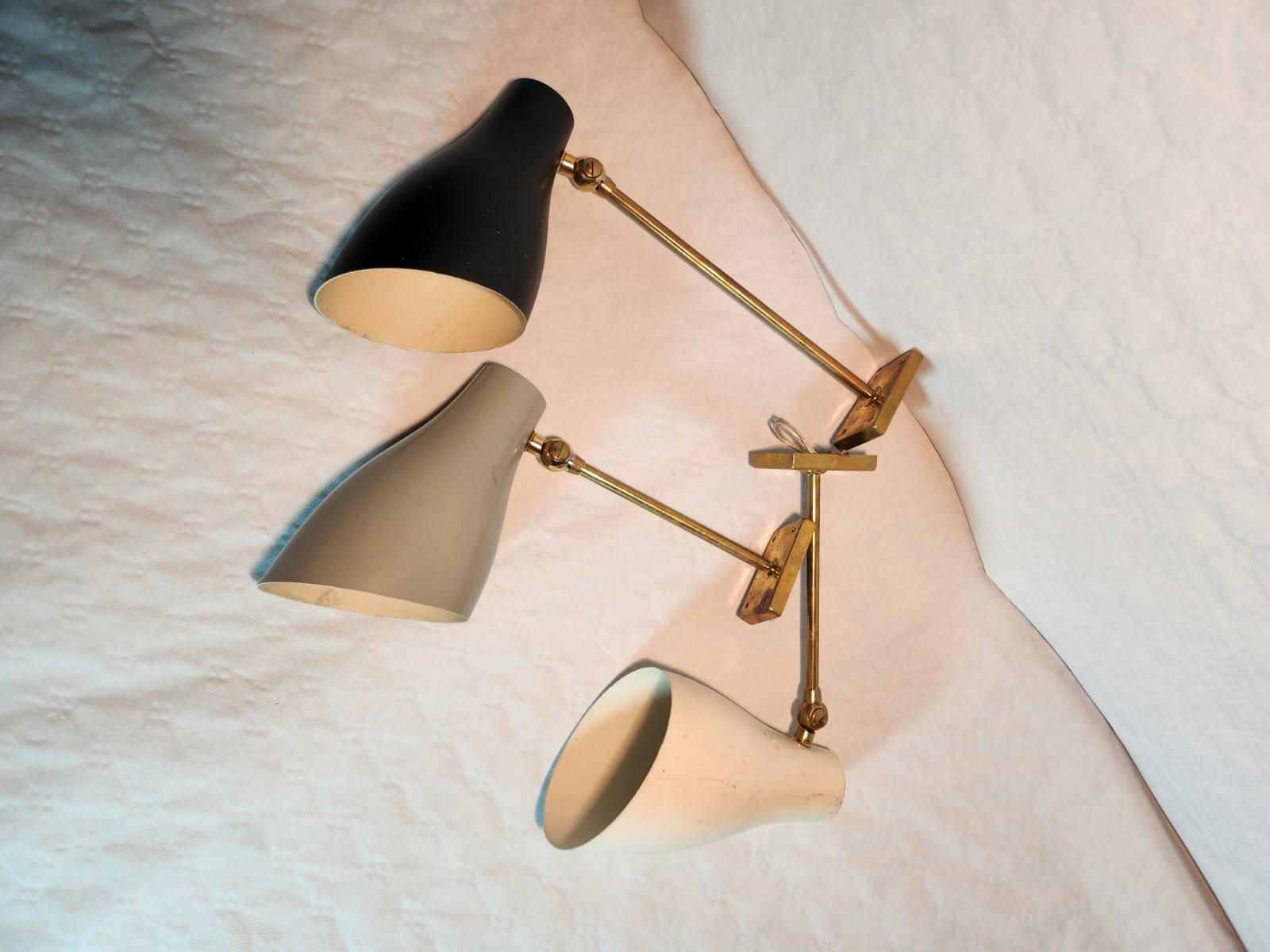 Mid-Century Modern Stilnovo trio of Mid Century wall sconces For Sale