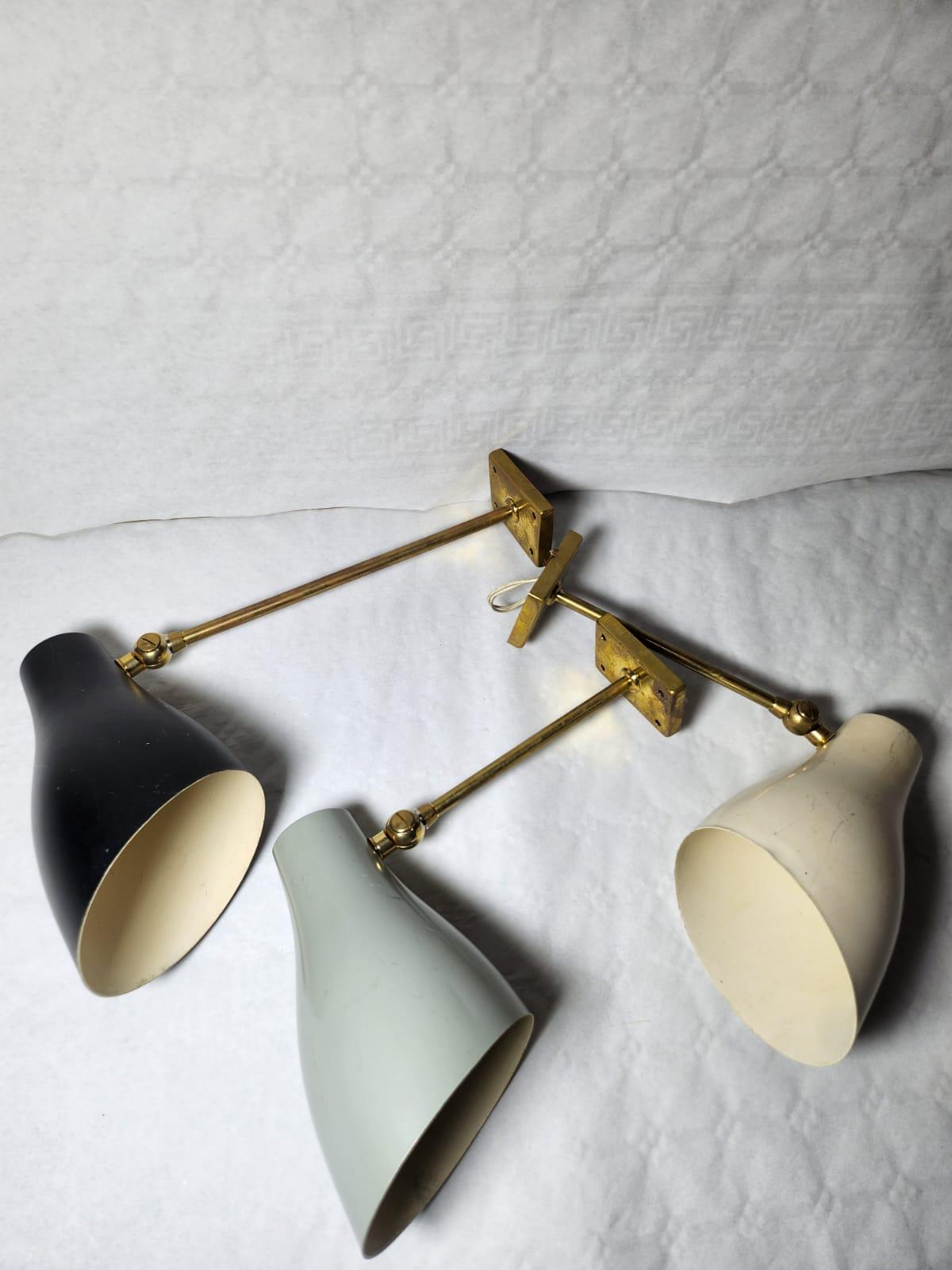 Italian Stilnovo trio of Mid Century wall sconces For Sale