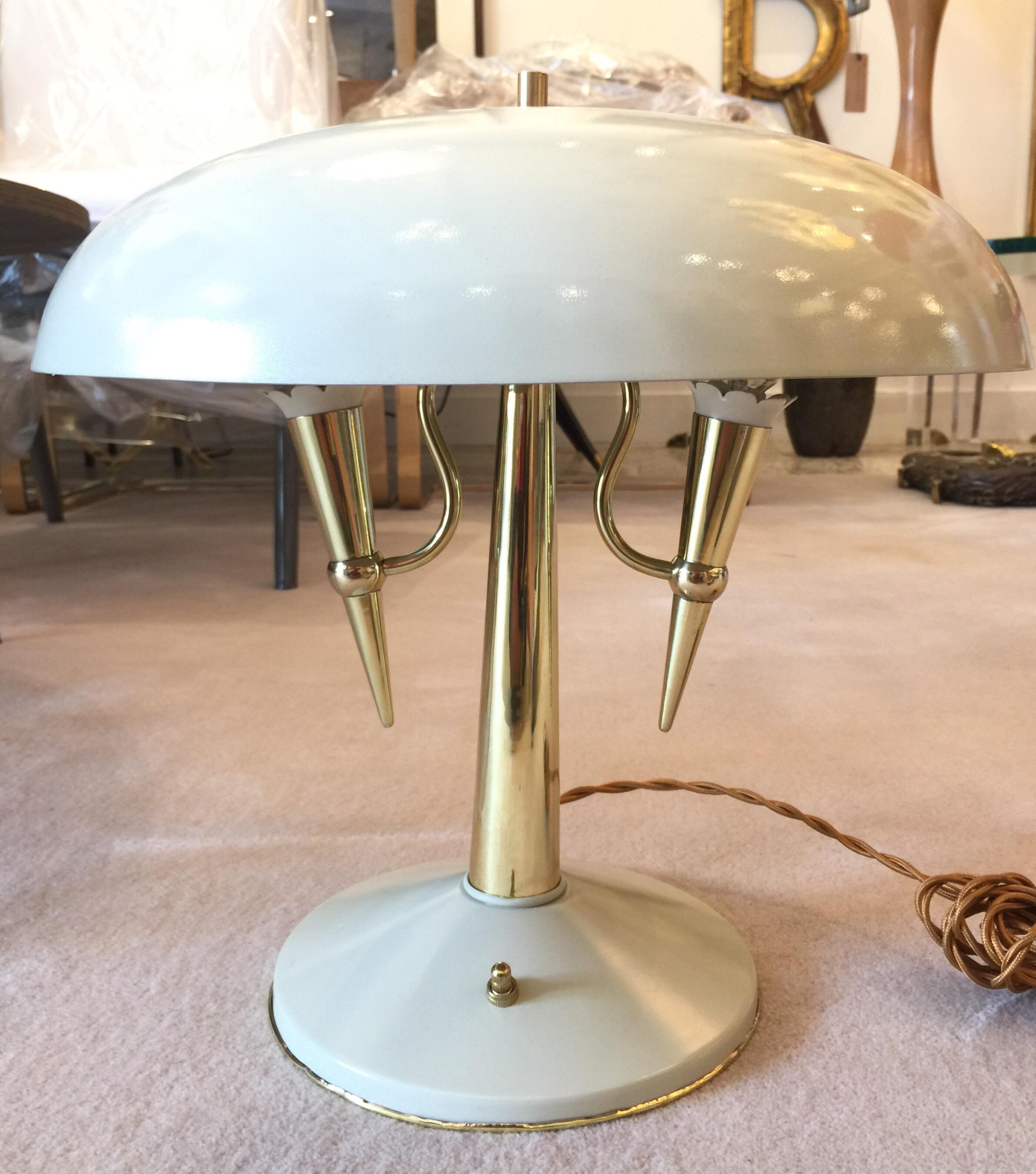Two E-14 sockets, full professional refurbish with silk cable, this fantastic and well proportioned lamp--likely designed by Oscar Torlasco.  Elaborate metal and brass details around sockets. 
