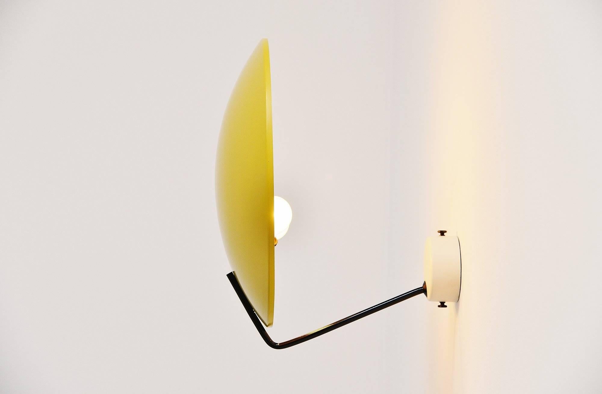 Very nice wall or ceiling lamp model 232, designed by Bruno Gatta for Stilnovo Italy in 1962. These lamps are often sold as Sarfatti but we have this lamp documented as a design by B. Gatta in an old Stilnovo importer catalogue. This lamp has a