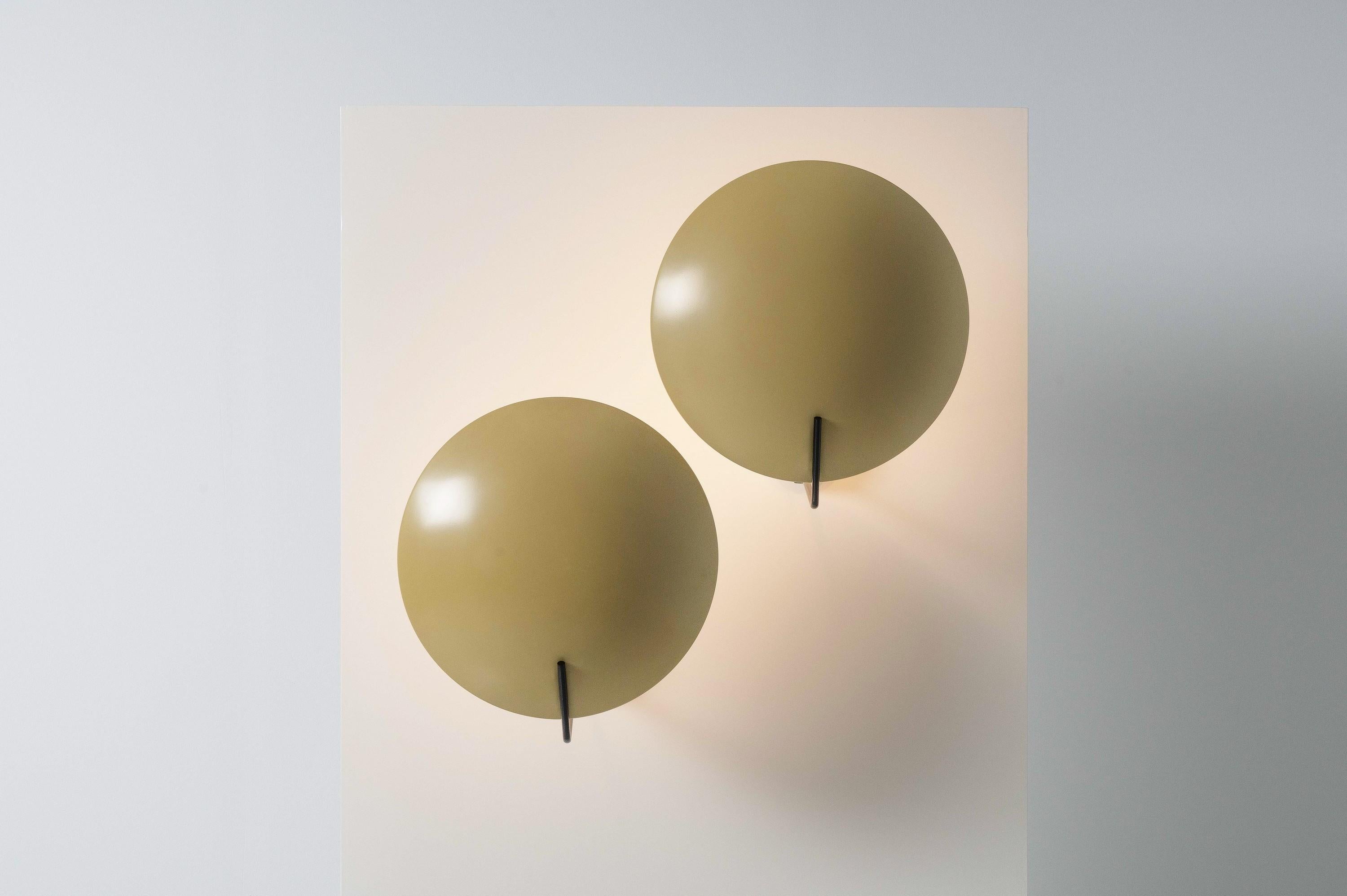 Nice and large pair of 'Model 232' wall lamps, designed by Bruno Gatta and produced in Italy by Stilnovo in 1955. These lamps are in fantastic and original condition and hard to find in a set like these, and have remained undamaged during their long
