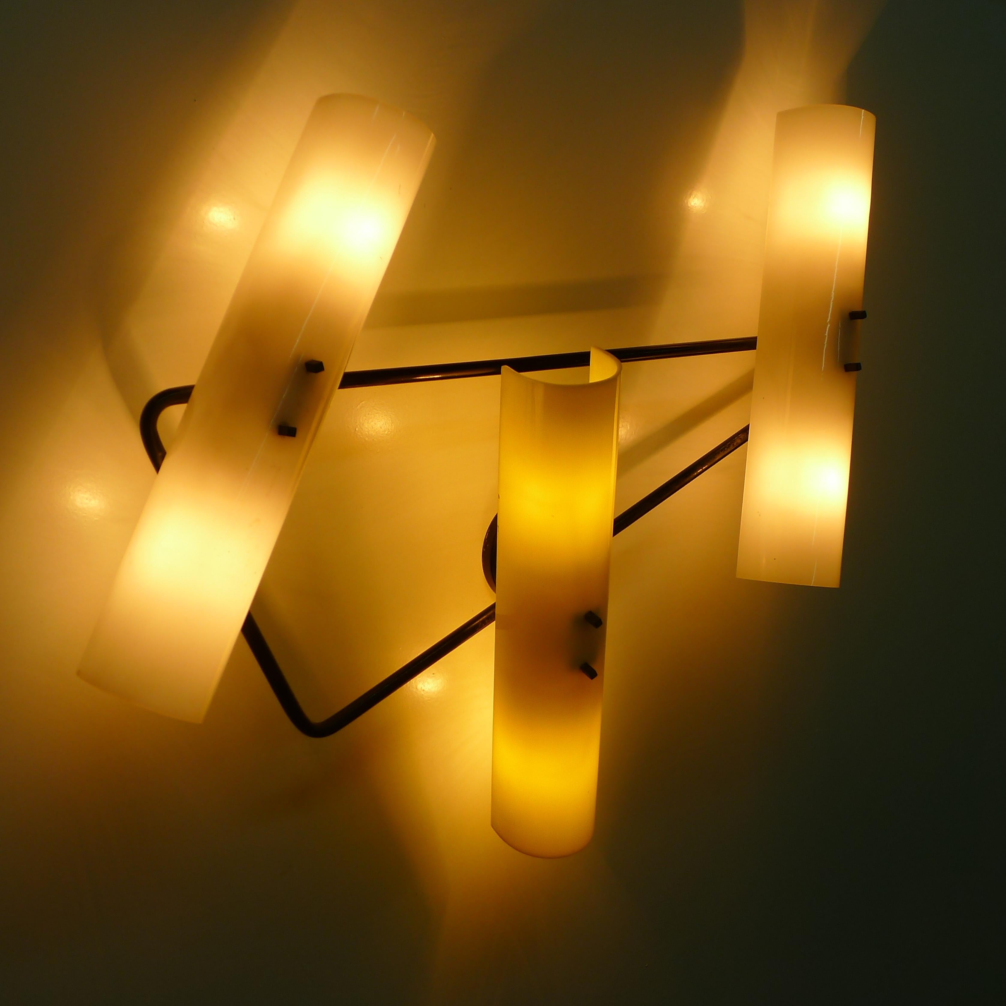 Stilnovo wall light, Yellow and White Acrylic Shades, Triangular Frame, 1960s For Sale 1
