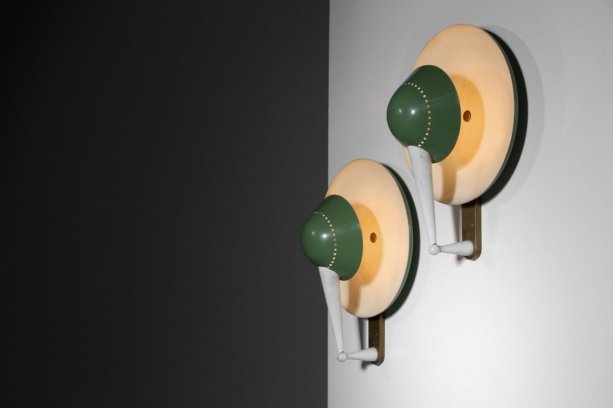 Rare wall lights model B4917 by Stilnovo.
Structure made of metal and brass.
Really nice design.
Light are adjustable, creating an amazing atmosphere.
Both with signature.