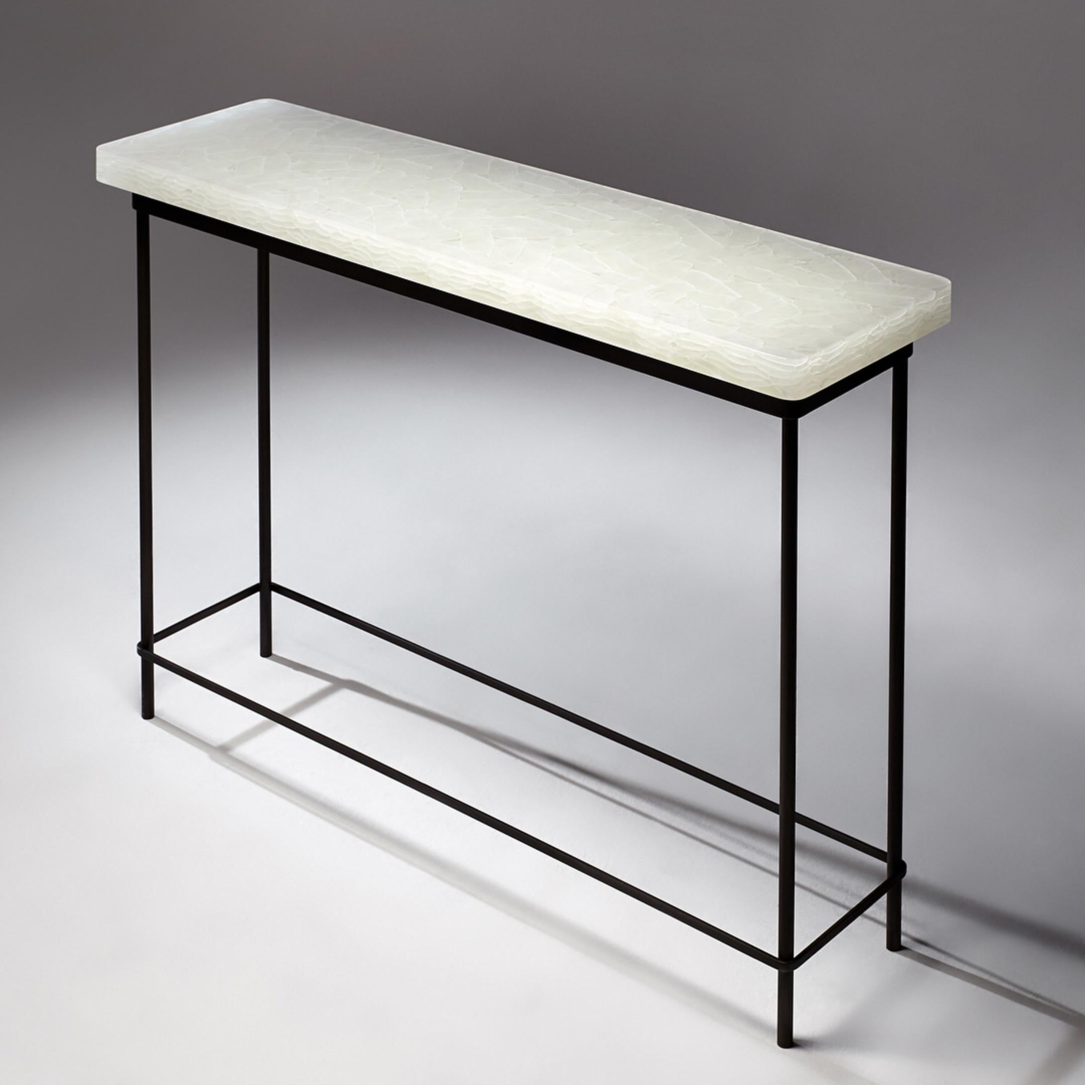 Stilts Console Table by The GoodMan Studio
Dimensions: W 36 x D 127 x H 84 cm
Materials: Metal, Glass, Steel

Kilncast and polished Glass and Steel Table base

The Goodman Studio has been internationally recognized for its modern blown glass