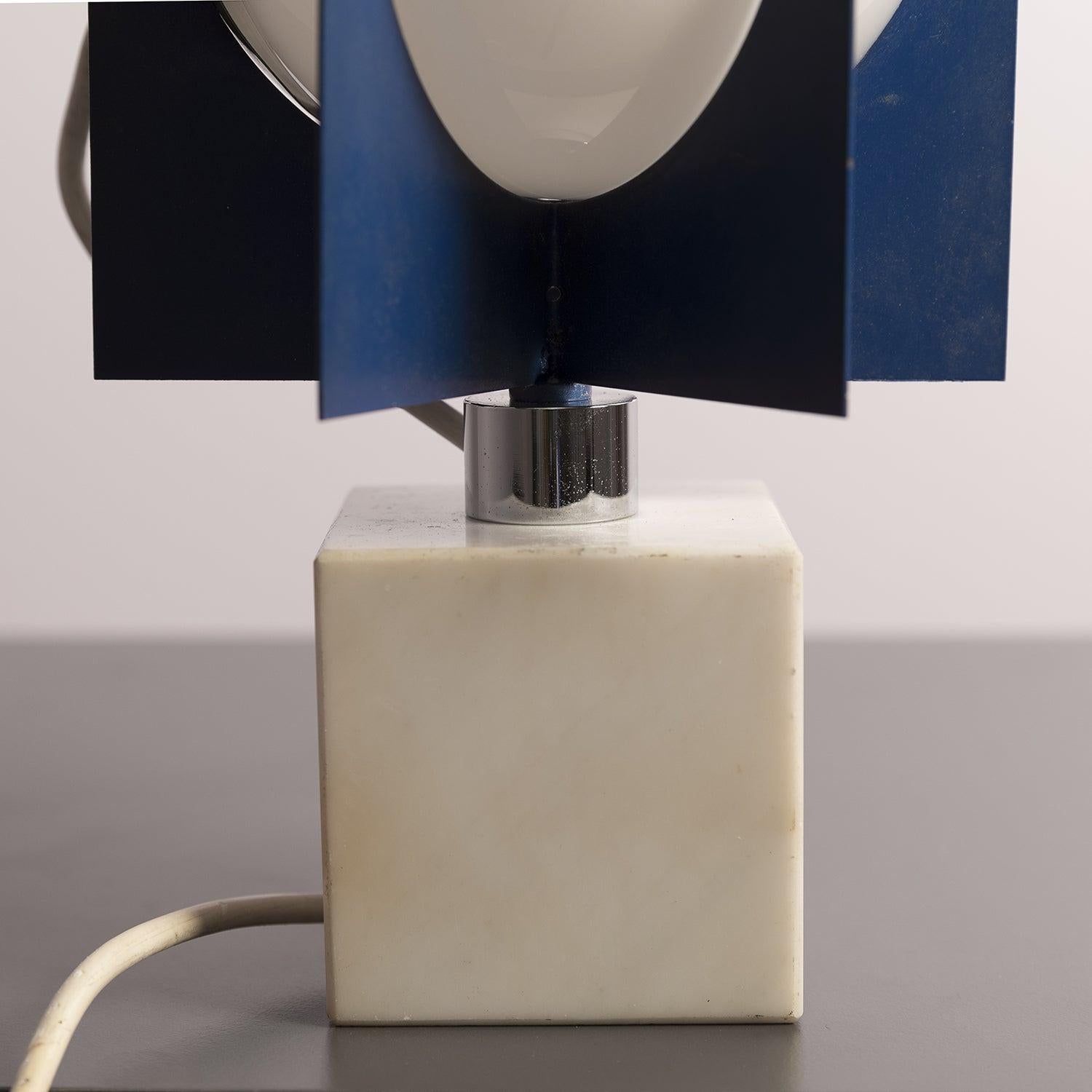 Table lamp with marble base, painted aluminum structure and three white opaline glass diffusers.
