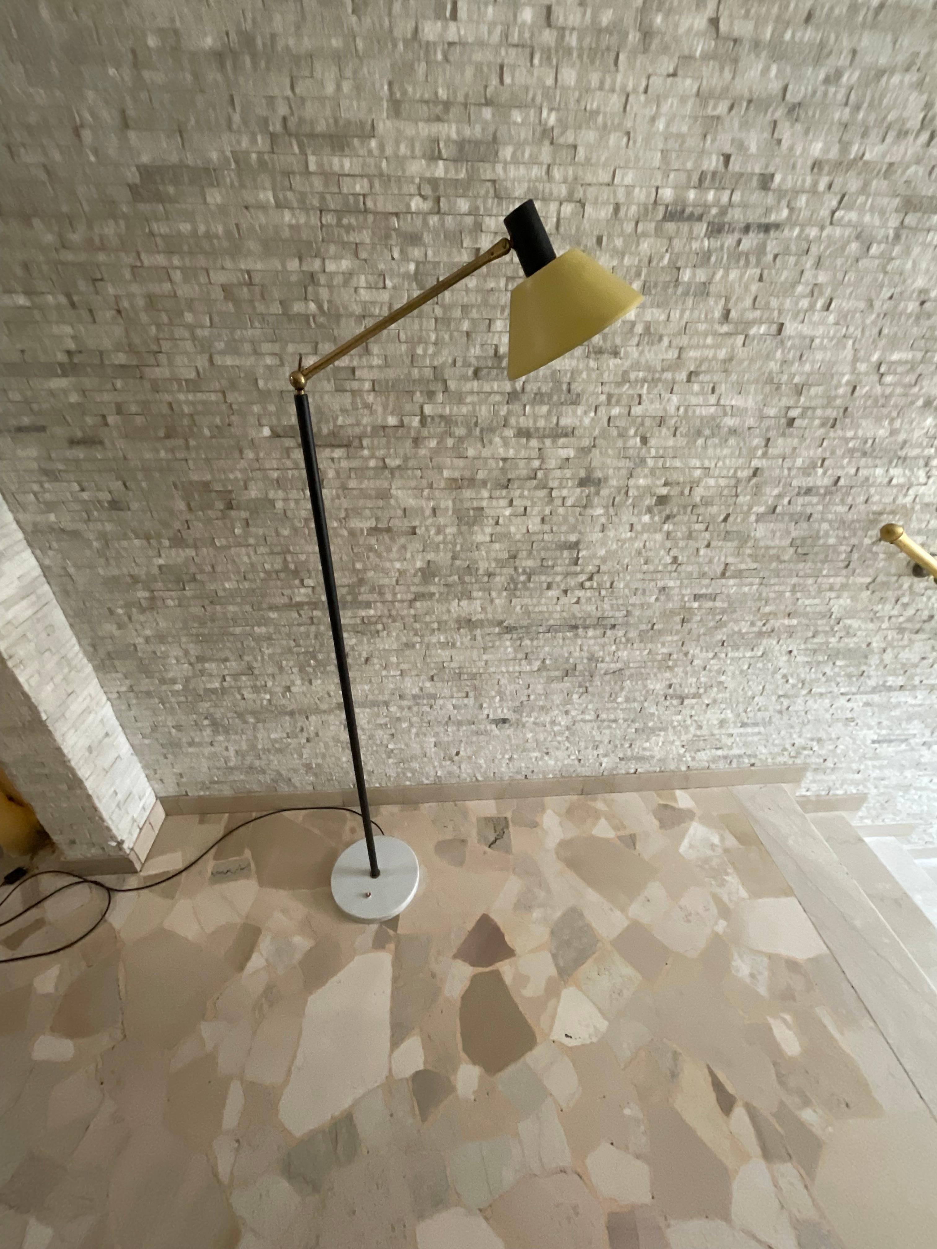 STILUX - Original floor lamp from 1950 in perfect condition, working, color is materials of the era , also bears the Stilux Made in Italy mark in the shade.
Studied in all details from materials of construction; brass,  yellow and black painted