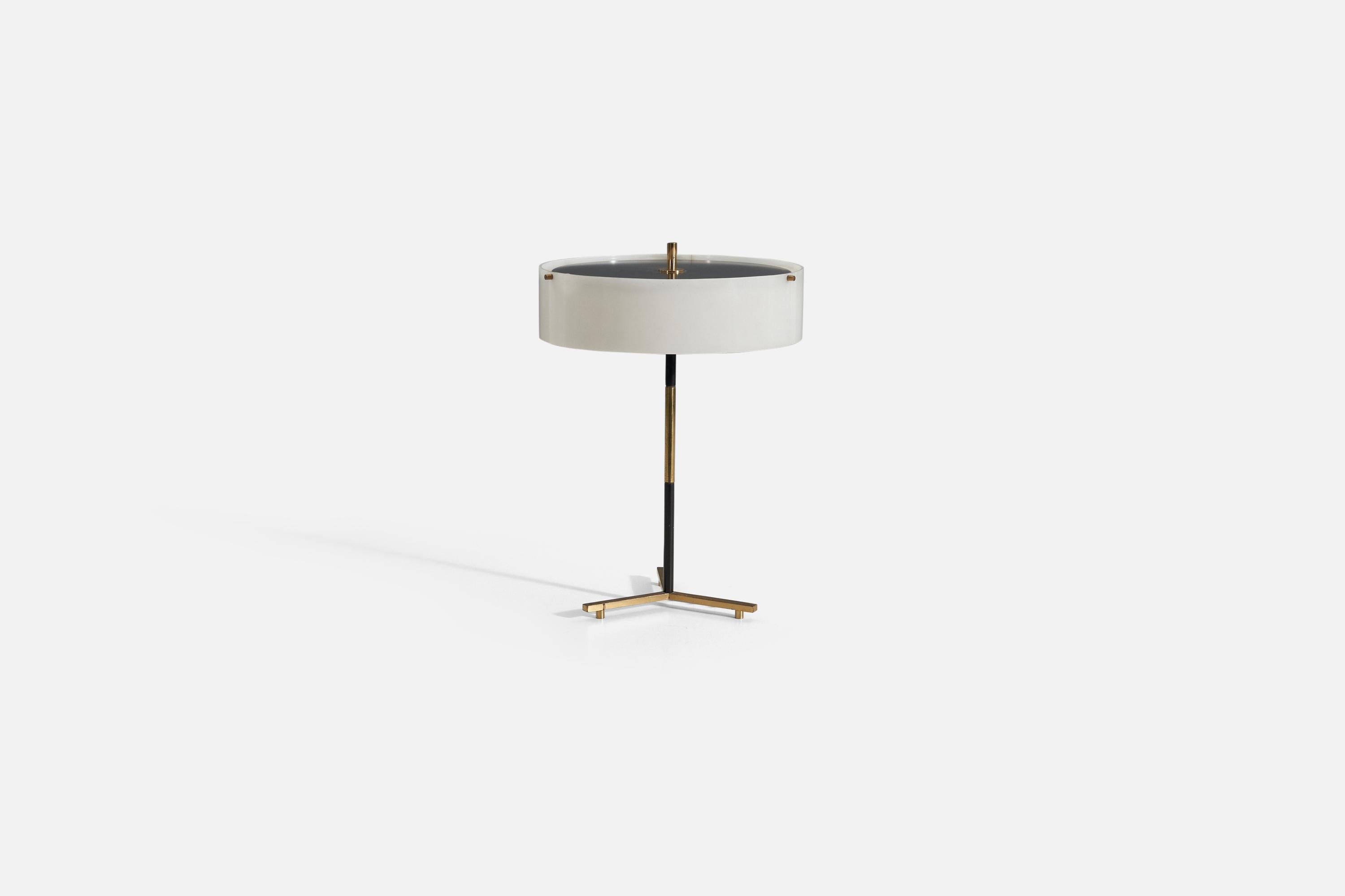 A table lamp in brass, black-lacquered metal, and acrylic designed and produced by Stilux Milano, Italy, 1950s-1960s.

 