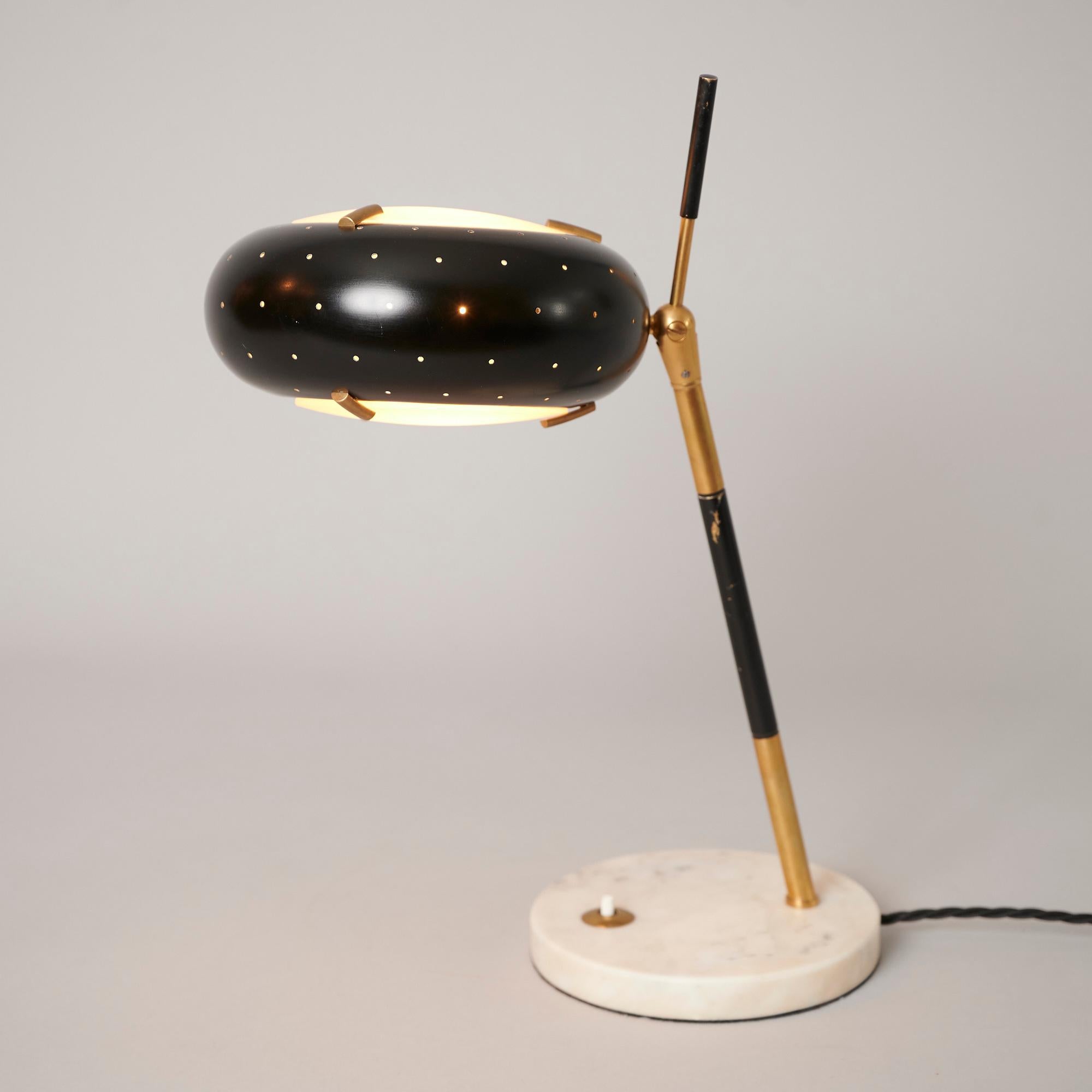 Wonderful table light by Stilux. 

Black lacquered shade with frosted glass. Brass details and marble base.

A truly beautiful lamp!

Re wired for the U.S. and for Europe. In lovely vintage condition.