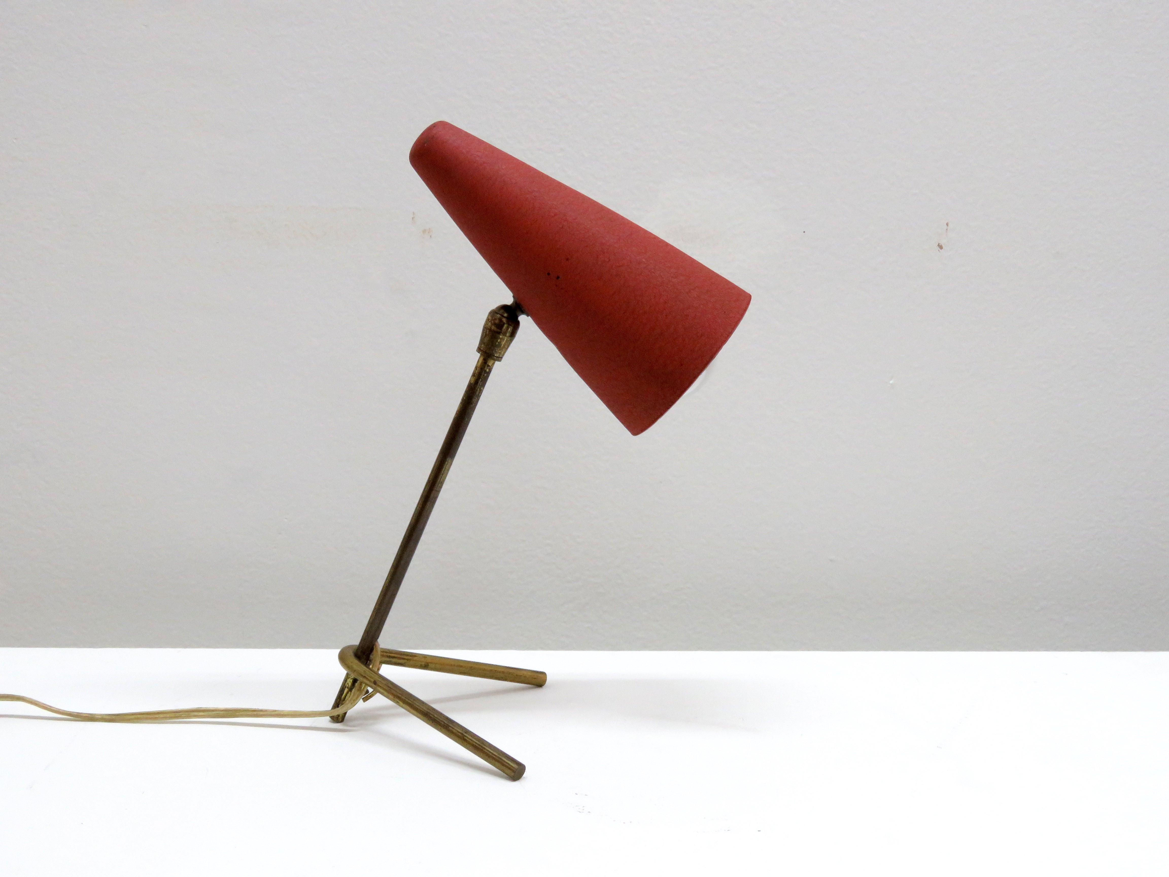 wonderful, petite table lamp by Stilux with patinaed brass frame and original, articulate red enameled shade, can be used as wall light as well. Wired for US standards, one E12 socket, max. wattage 60w, bulb provided as a onetime courtesy. Can be UL