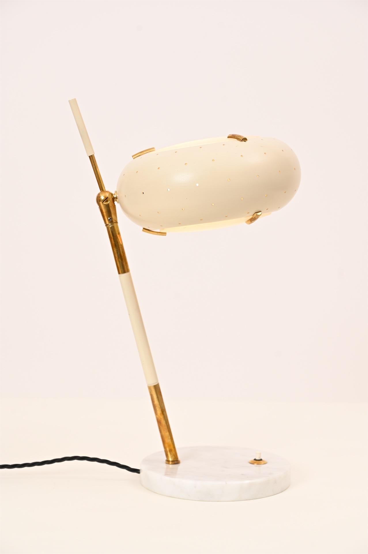 Original Stilux table light. Italy, circa 1950. Has sometimes wrongly been attributed to Arredoluce. 

Painted aluminium, glass, brass and marble.