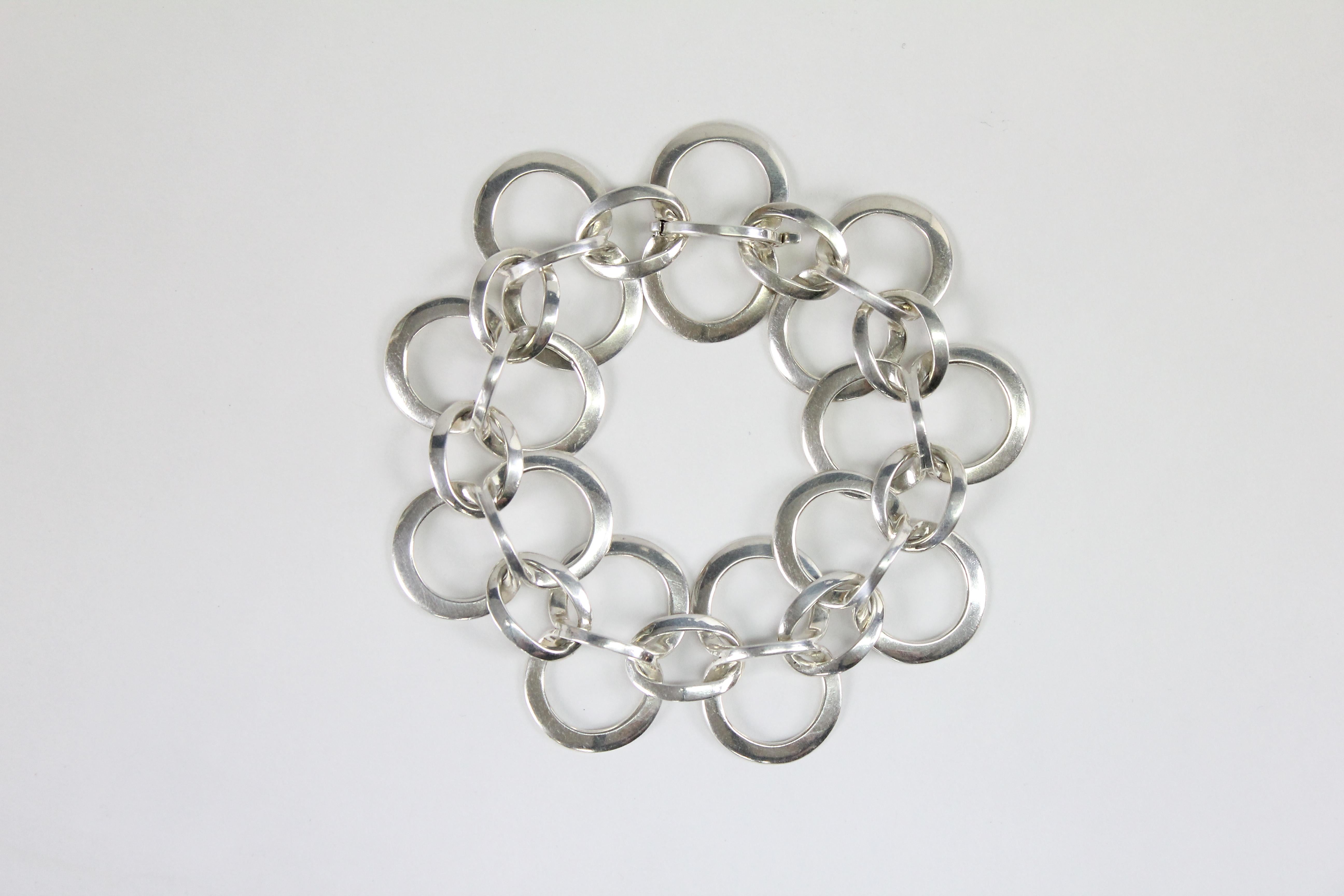 Wonderful modernist bracelet by Swedish designer Stina Sökjer-Peters.
Made in Sterling silver in 1978. Fully marked and with artist signature.

Very nice condition. No issues!

