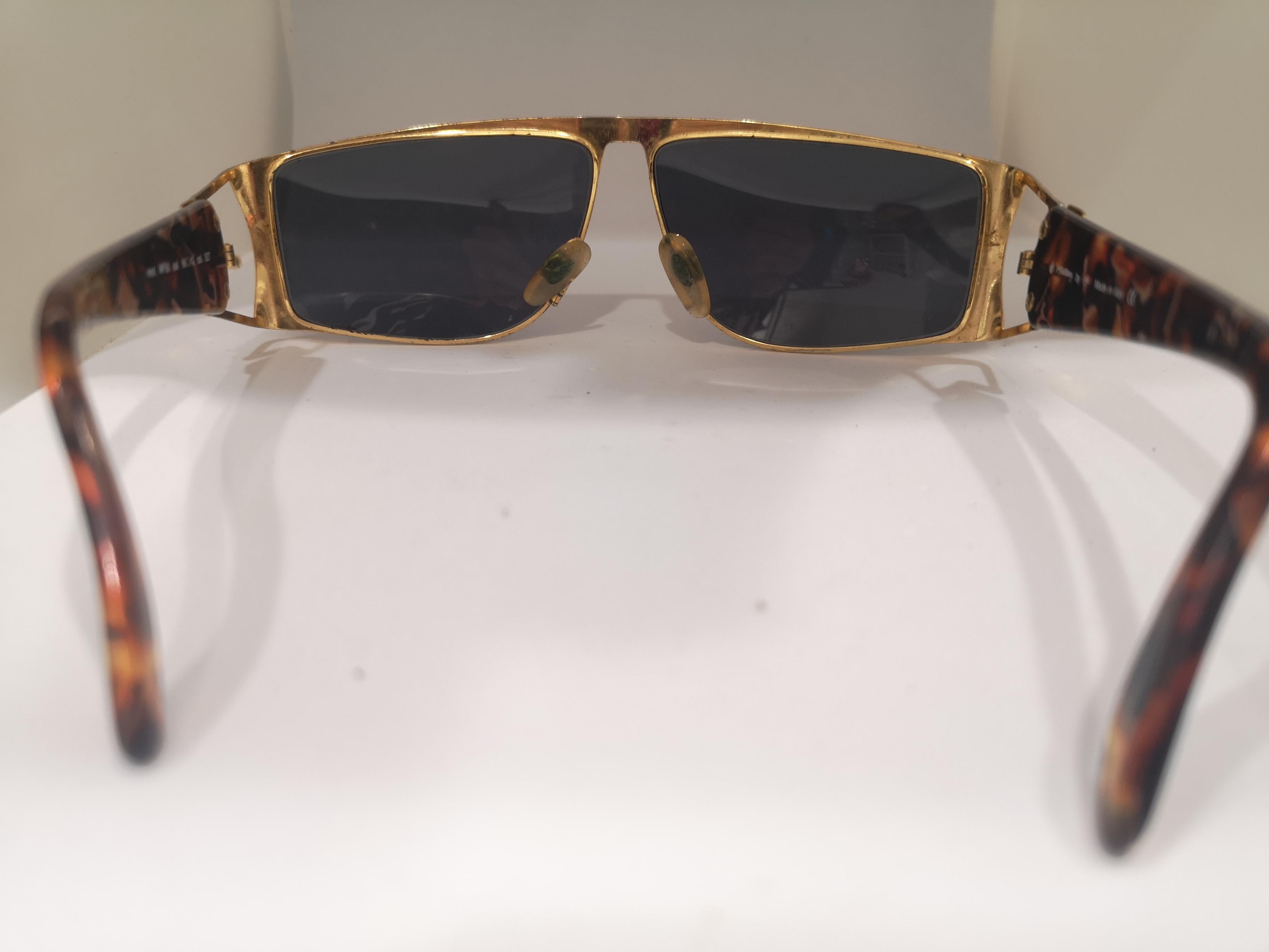 Black Sting black lens gold tortoise sunglasses