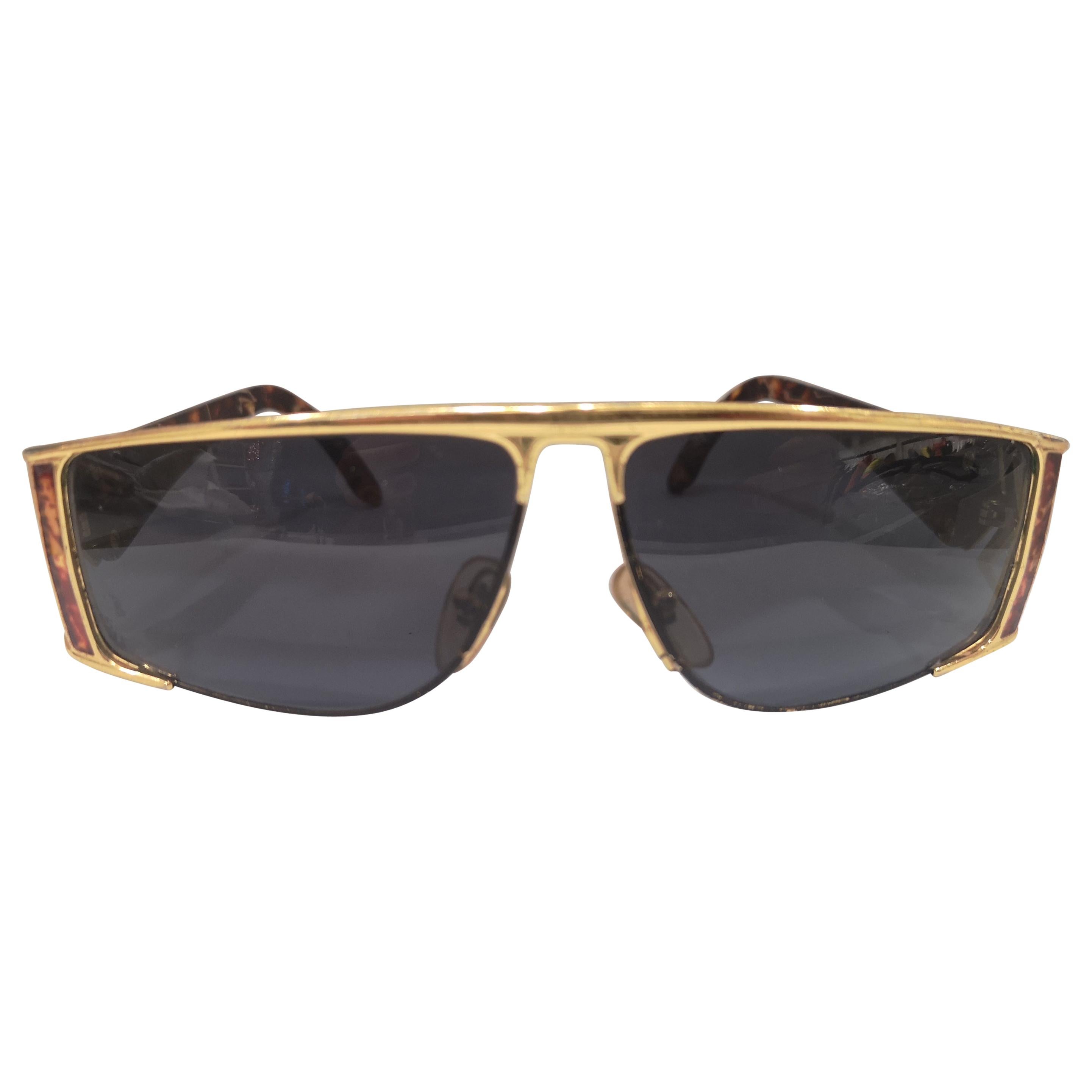 Sting black lens gold tortoise sunglasses