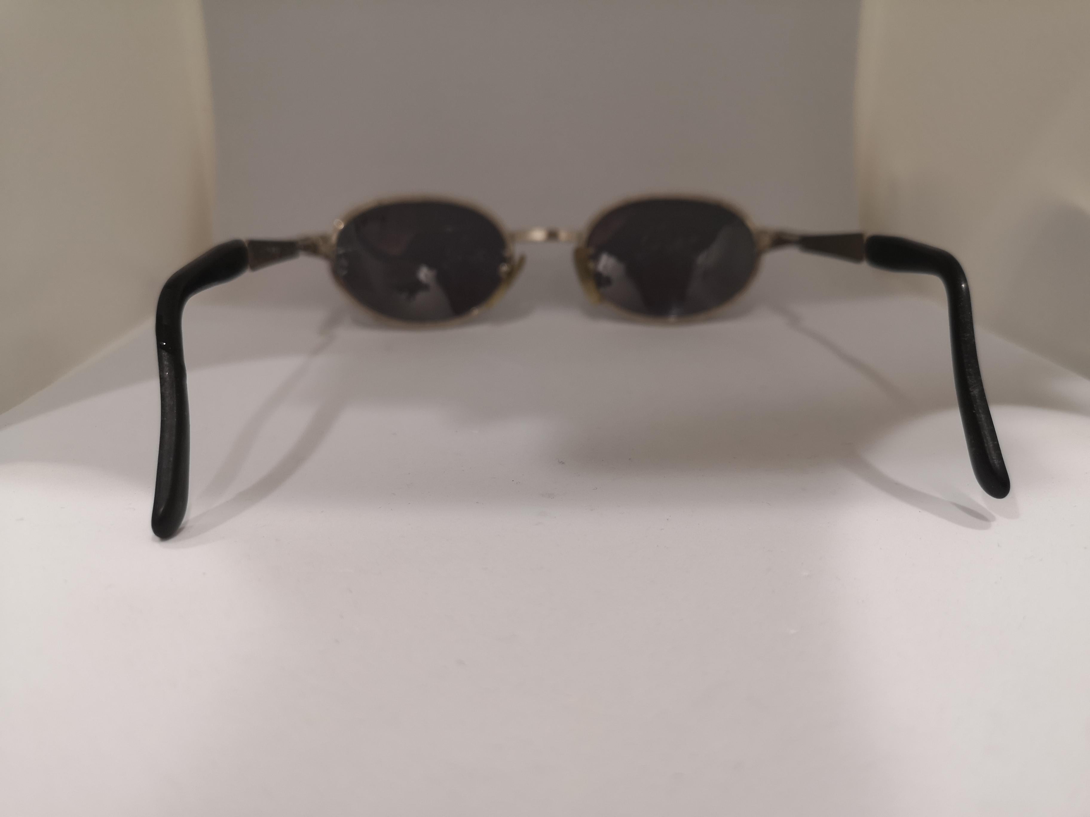 Women's or Men's Sting black lens silver sunglasses