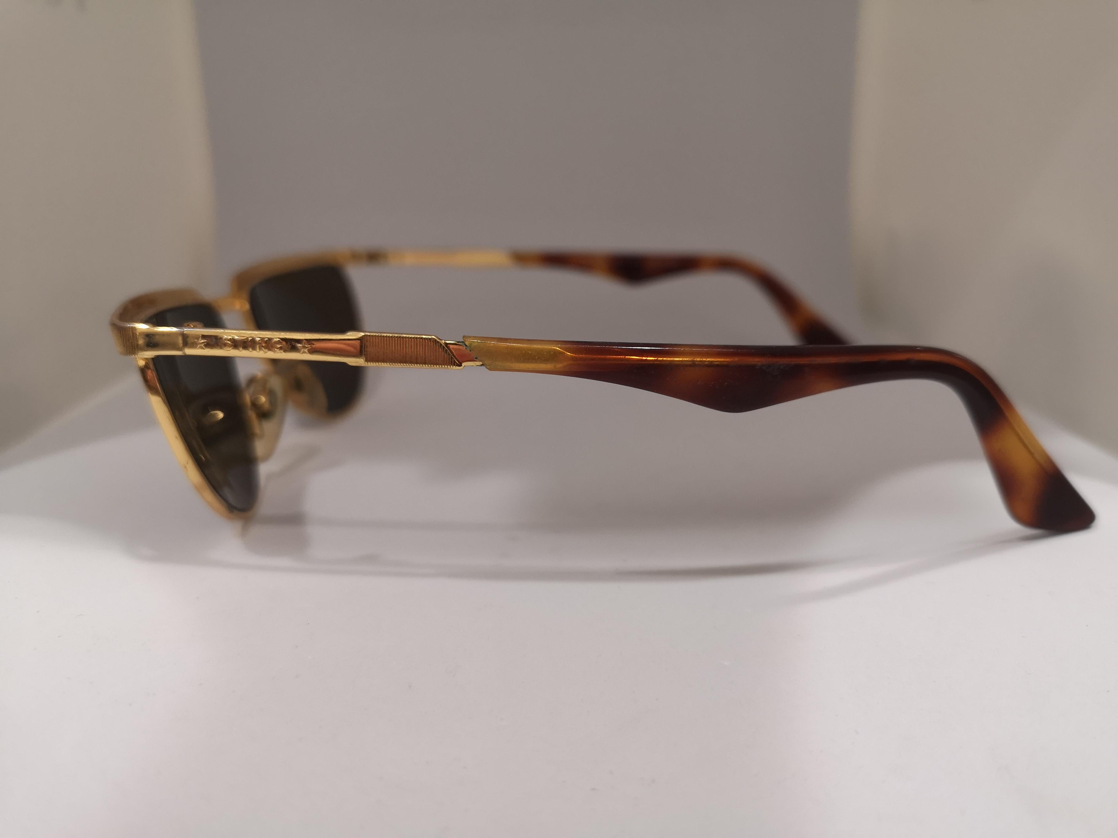 Sting black lens tortoise gold sunglasses 1
