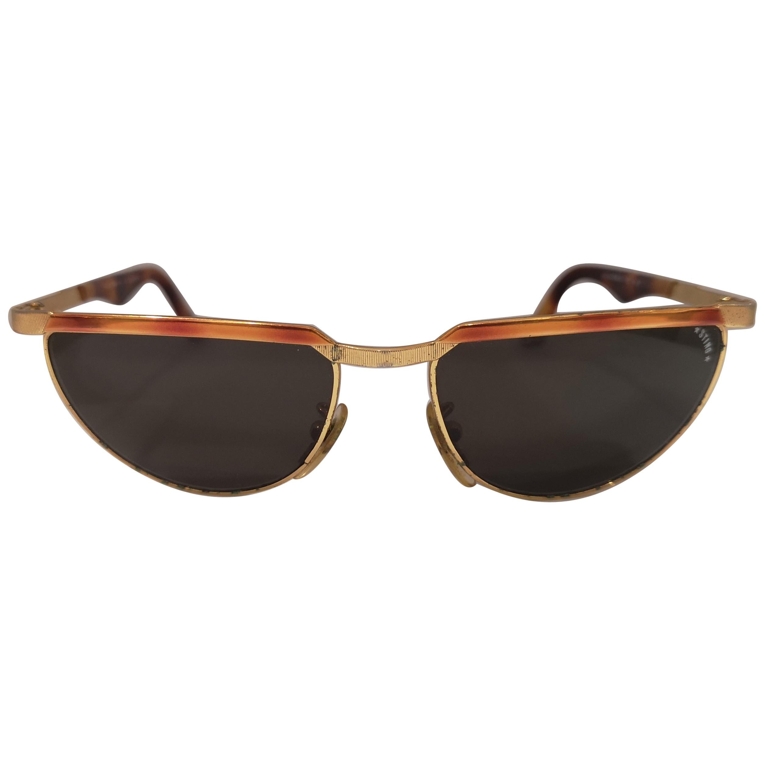 Sting black lens tortoise gold sunglasses