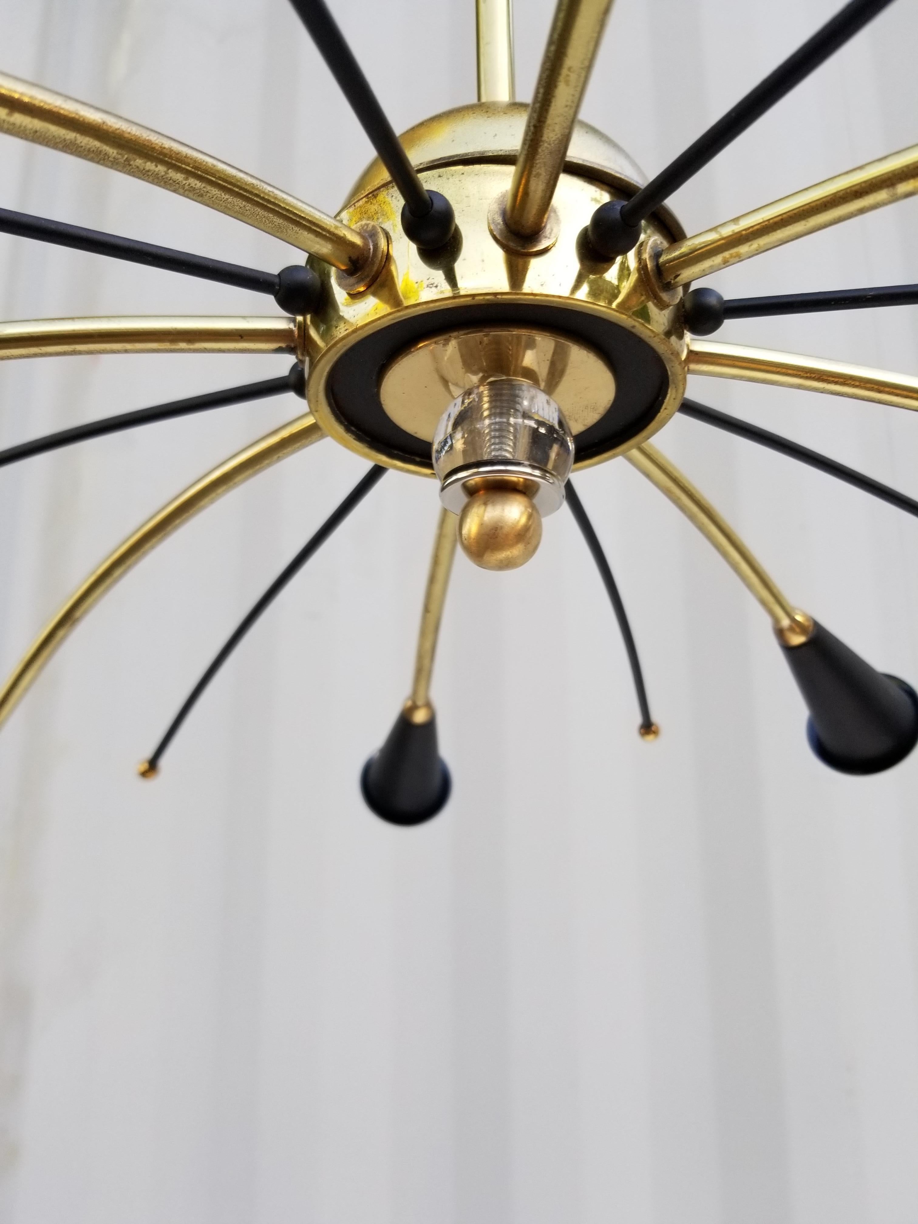 Stilnovo style 8-light chandelier, 40 watts max bulb.
US rewired.
Stem dimension can be modified, from 6 to 28 inches.