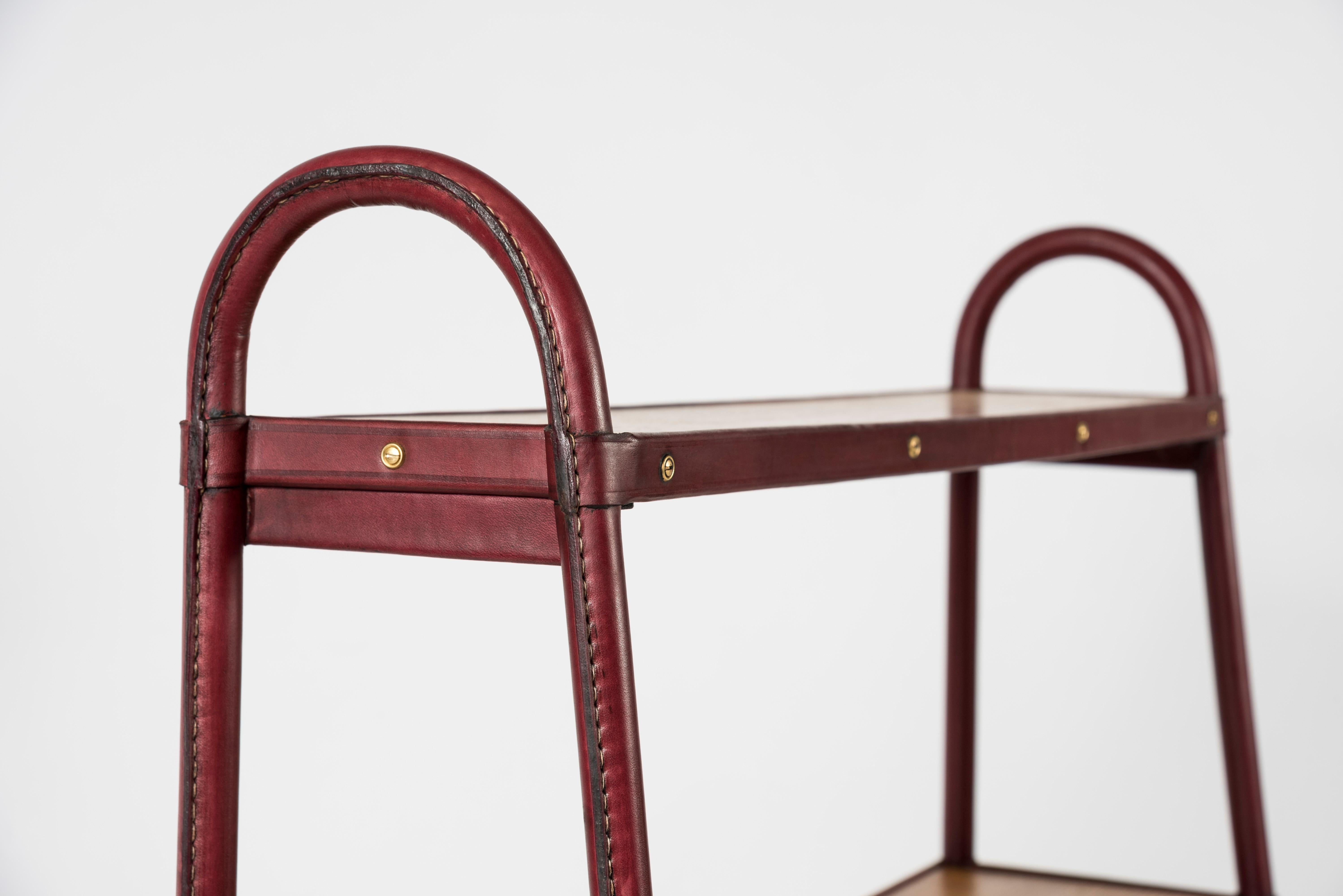 Stitched leather Bookrack by Jacques Adnet In Good Condition In Bois-Colombes, FR