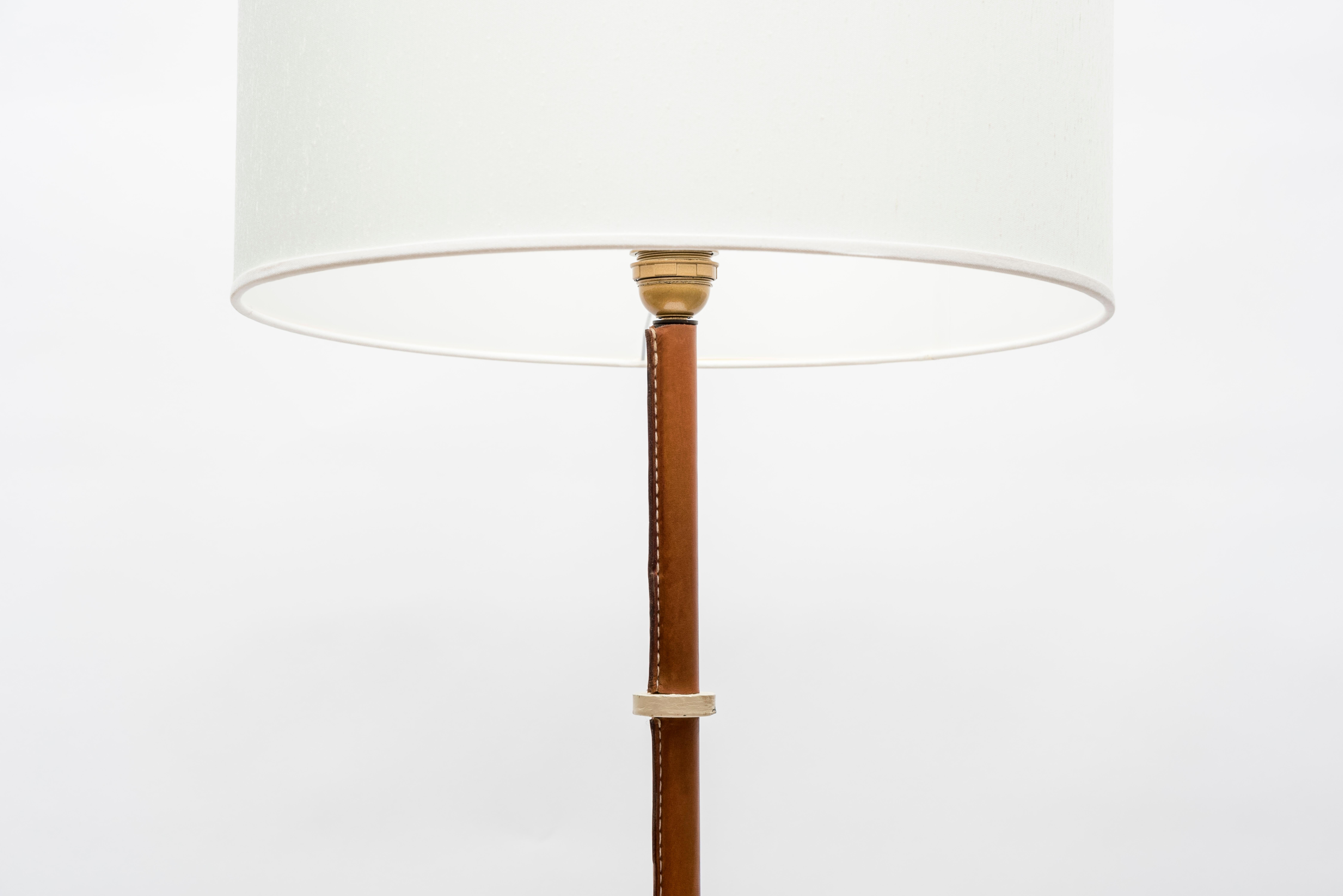 French Stitched Leather floor lamp by Jacques Adnet For Sale
