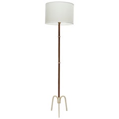 Stitched Leather floor lamp by Jacques Adnet