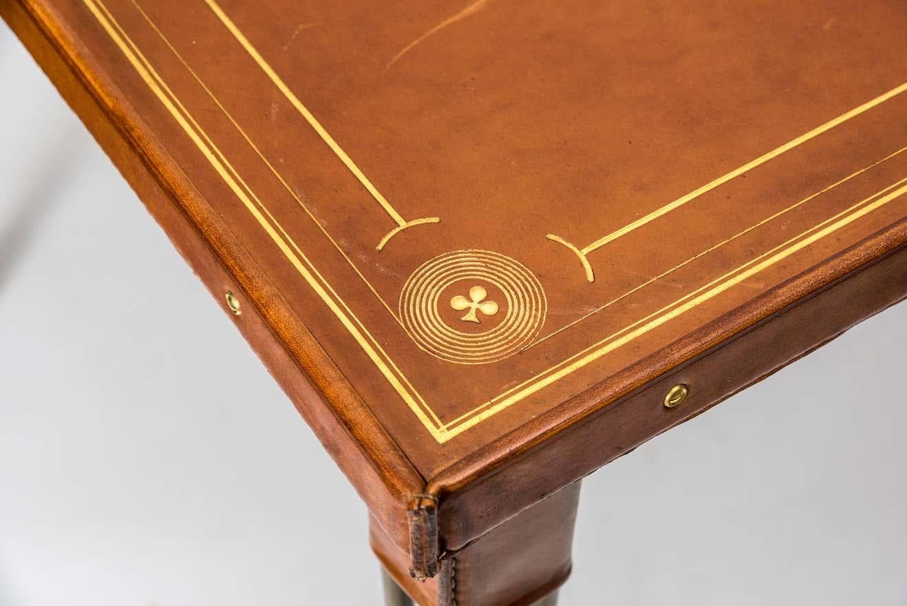 Stitched Leather Game Table with Embossed Motifs and Metal Legs by Jacques Adnet 1