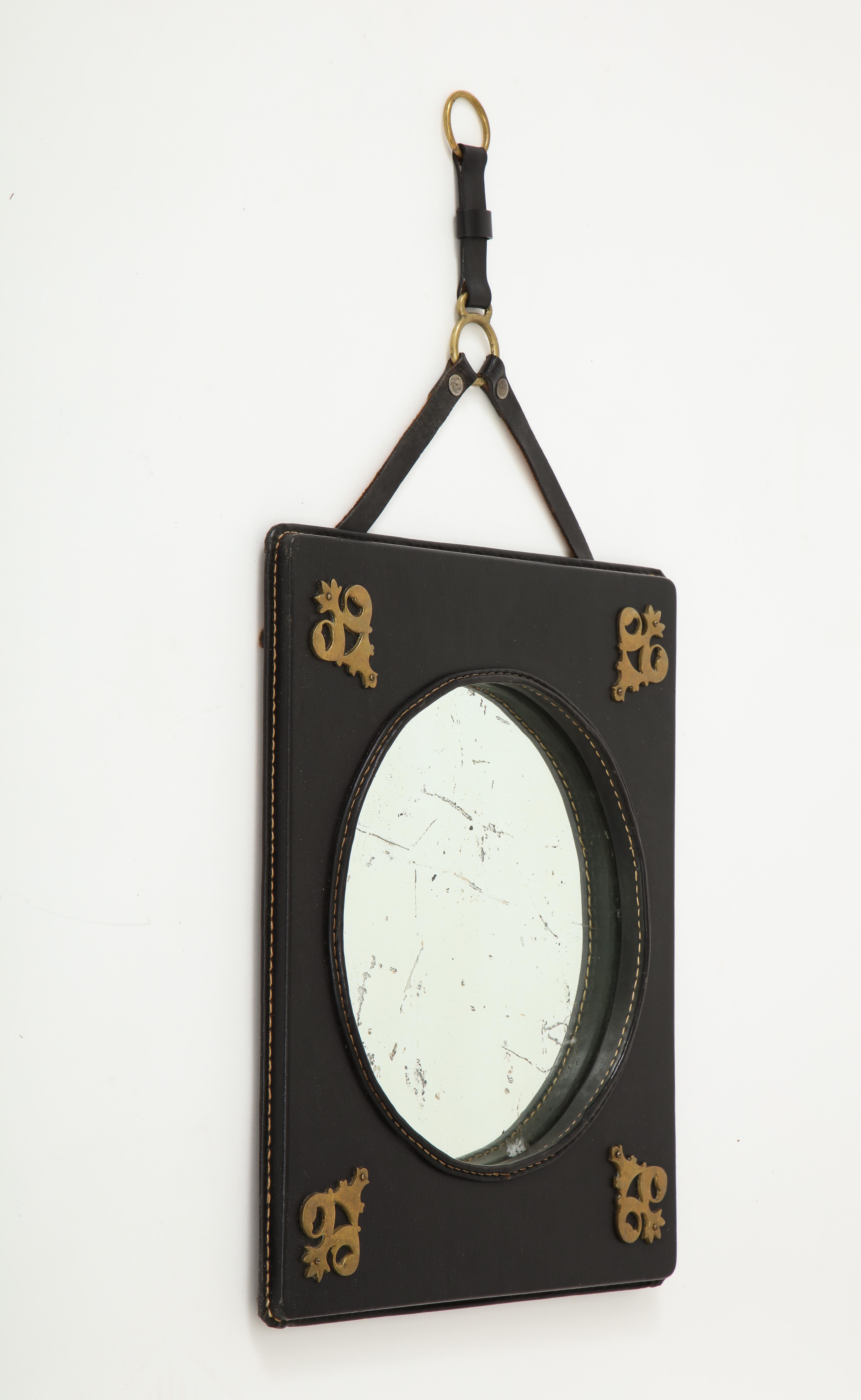 Stitched leather mirror by Jacques Adnet
1950s
France
Possibility of a second one to make a pair
Price given for one.