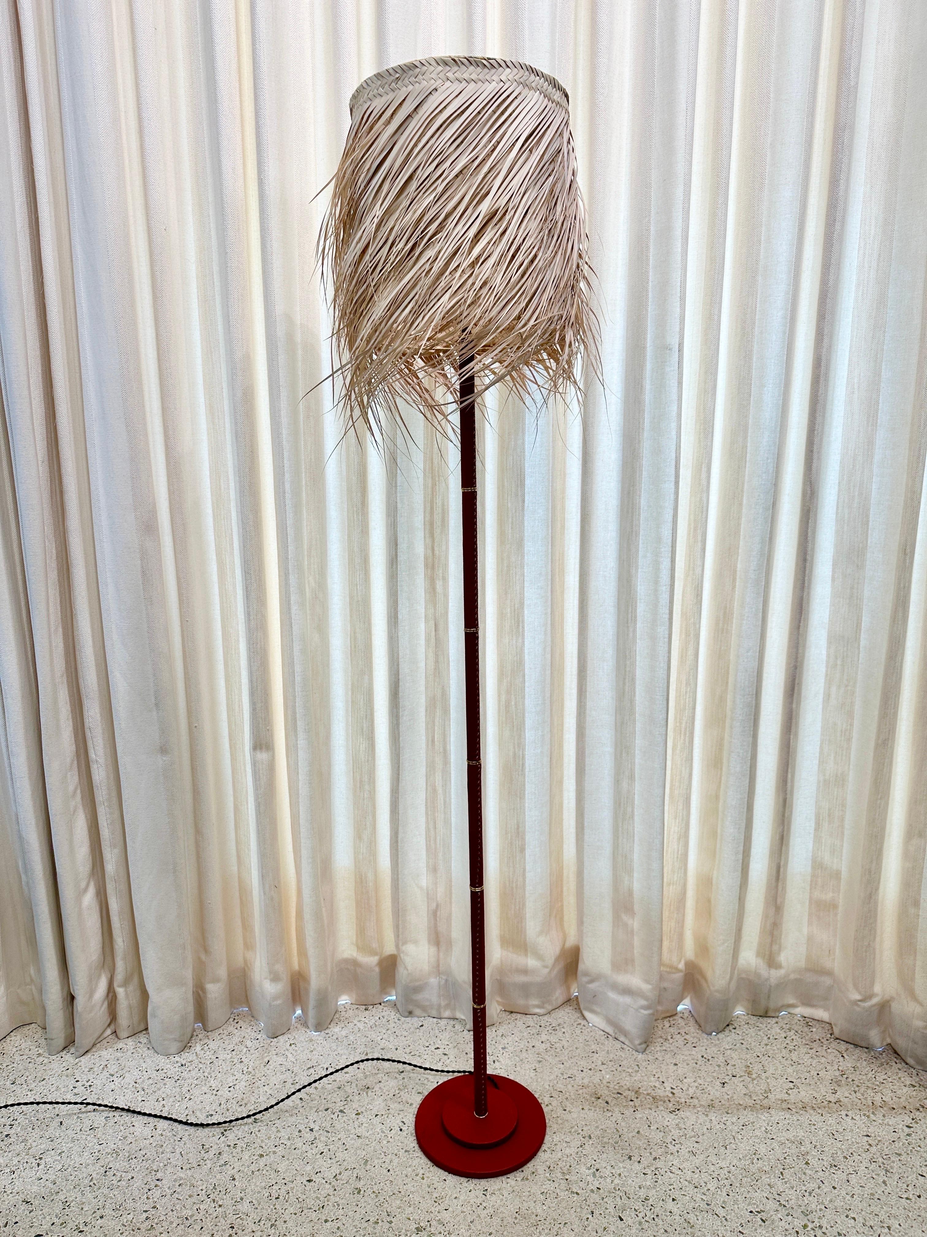 Beautiful burnt Sienna stitched leather floor lamp.  This is a wonderful accent to any design.  Shade shown for scale and photography purposes, NOT INCLUDED. 
