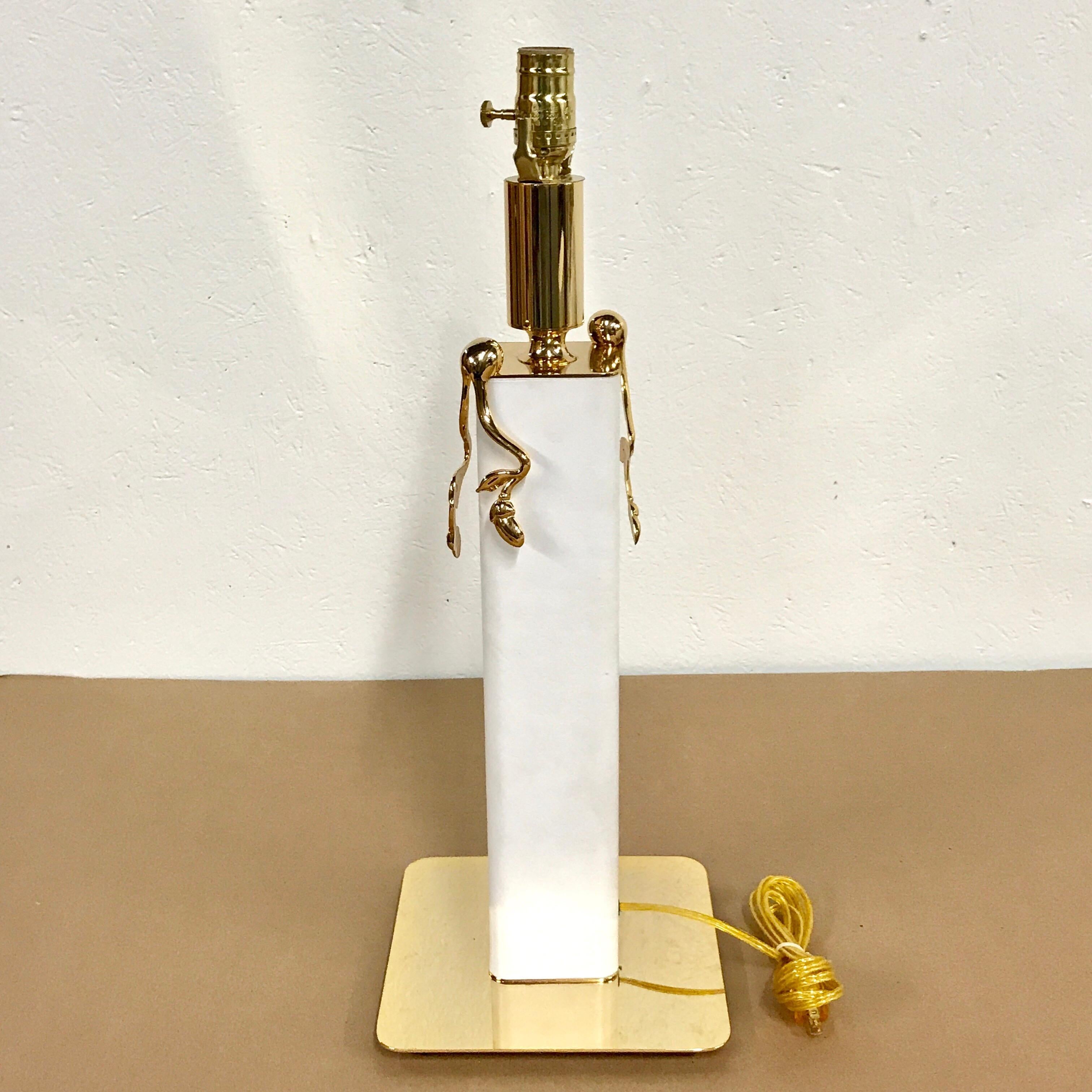 Stitched white leather and gilt brass lamp, with 4