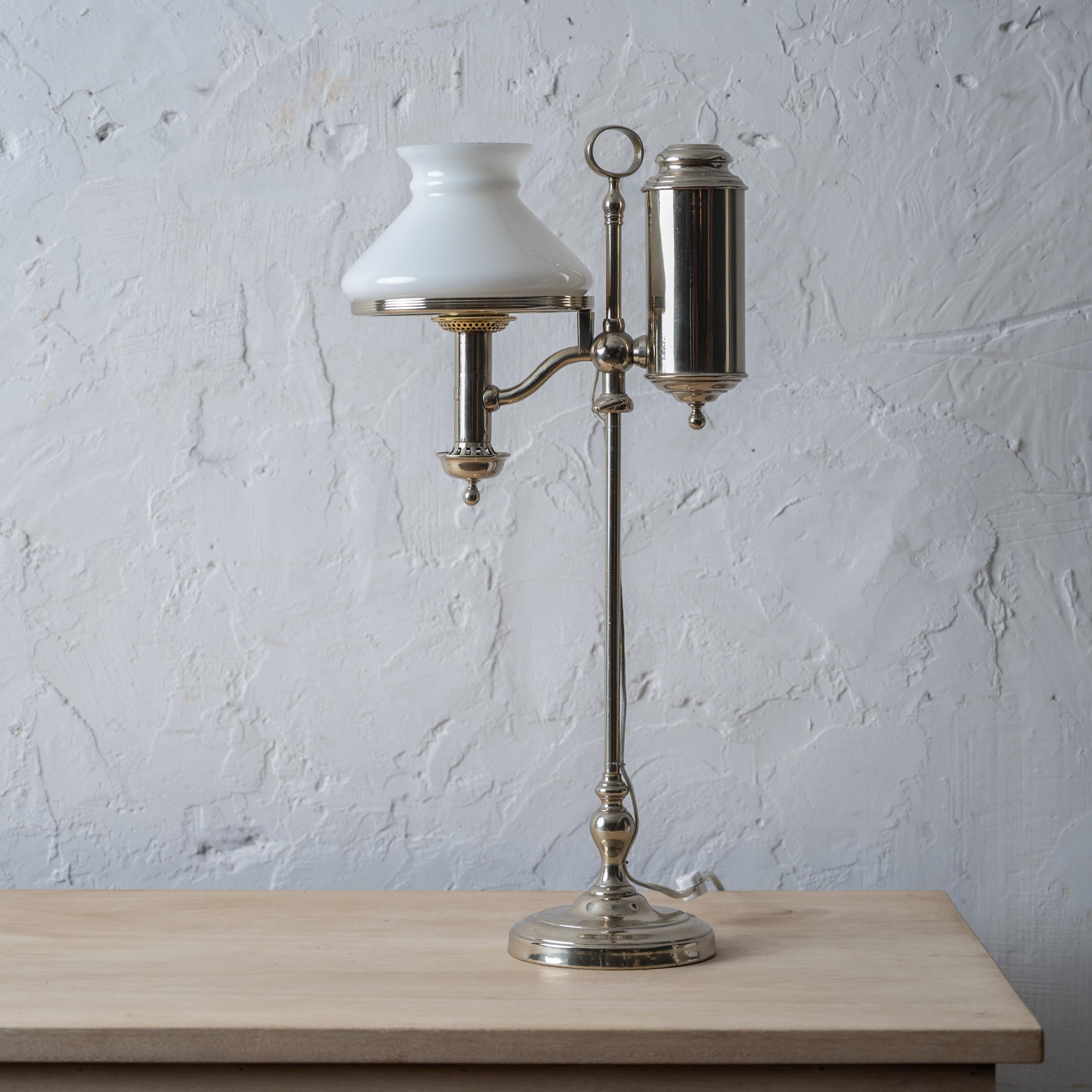 A nickel plated electrified student lamp by Stobwasser, Berlin, circa 1880.



10 ¼ inches wide by 6 ½ inches deep by 21 ¼ inches tall





