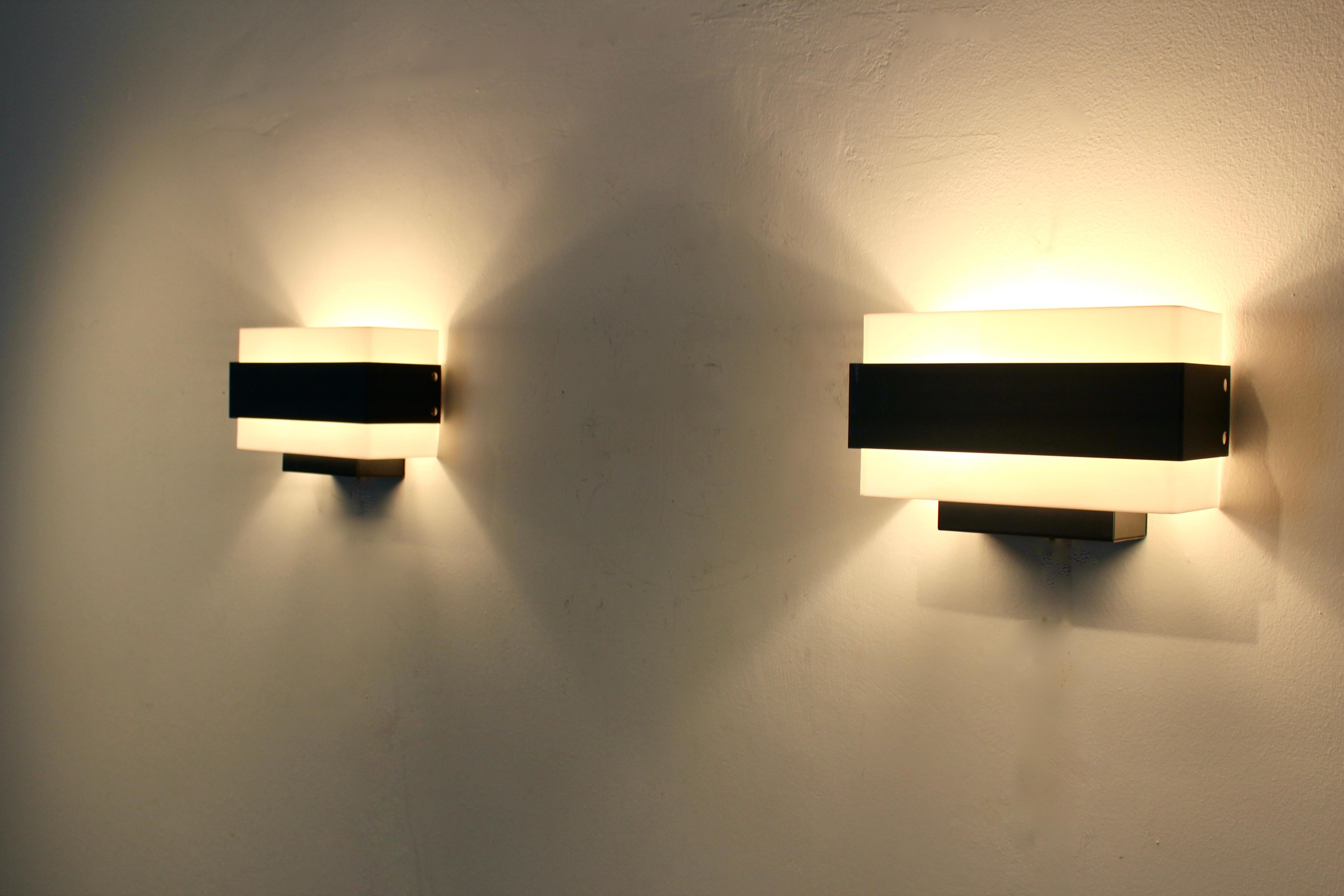 Dutch Stock of Louis Kalff Philips Wall Sconces in Black and White For Sale
