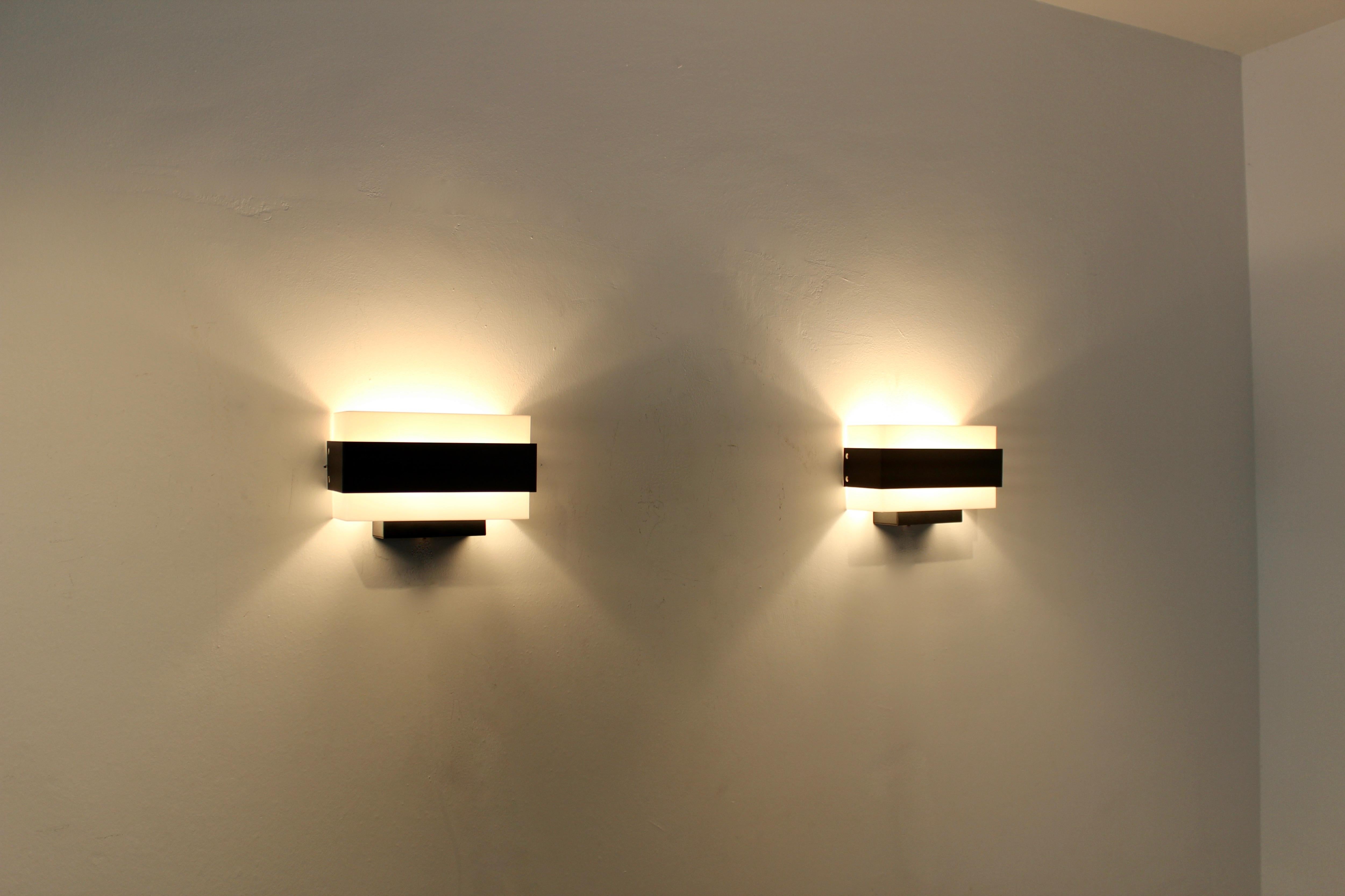 20th Century Stock of Louis Kalff Philips Wall Sconces in Black and White For Sale