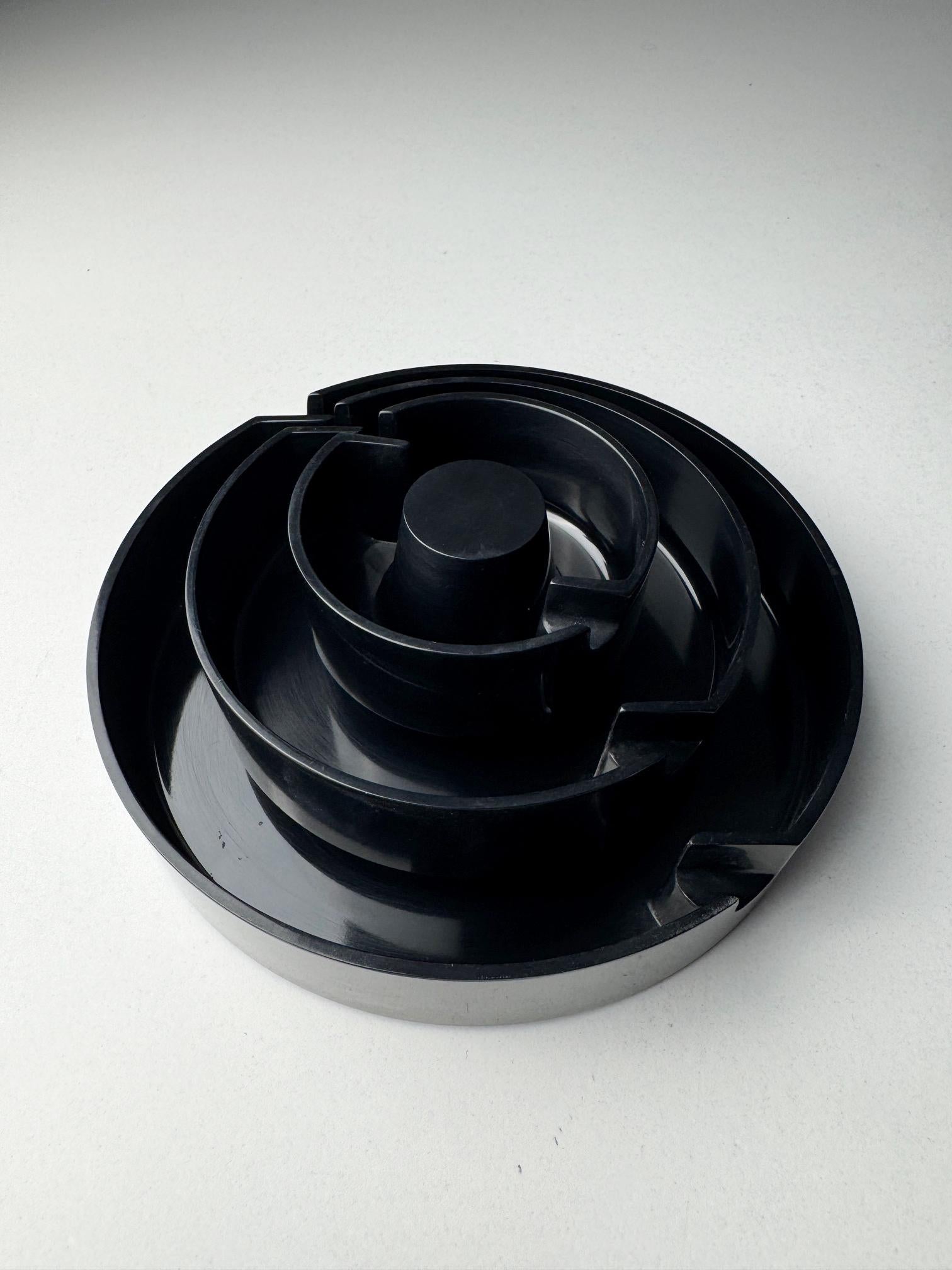 This Stockholm ashtray, designed by renowned Spanish industrial designer André Ricard in 1967, is a masterpiece of functional minimalism. Originally created for Flamagas, the Stockholm ashtray is an iconic design piece from the mid-century era,