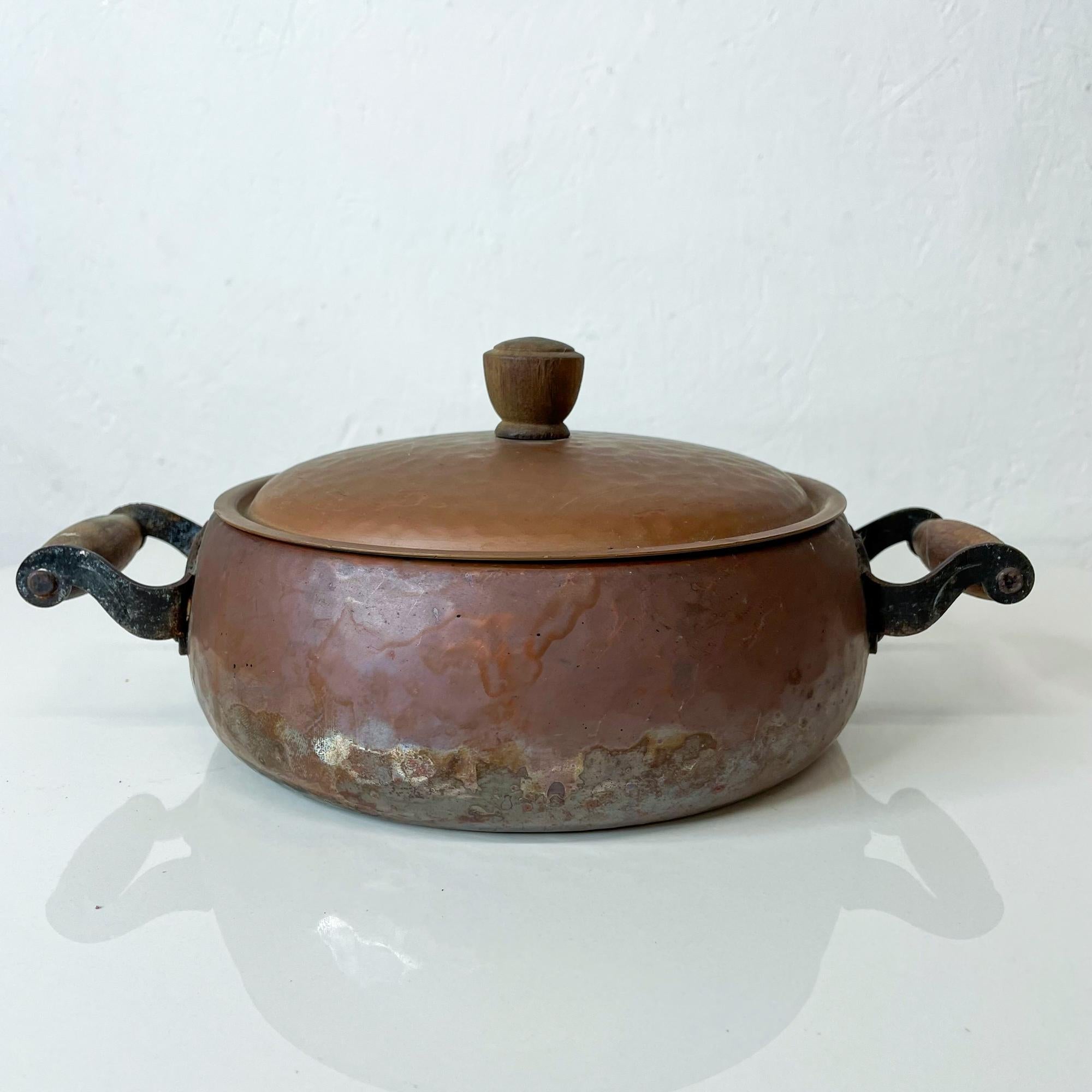 Swiss made Stockli Netstal Vintage Hammered Copper Casserole Dutch Oven Pot with Cover Lid
Vintage copper pot with sculptural wood handles
Made in Switzerland Stamped by maker
Measures: 11 Width x 7.75 diameter x 4 tall inches
Item used with