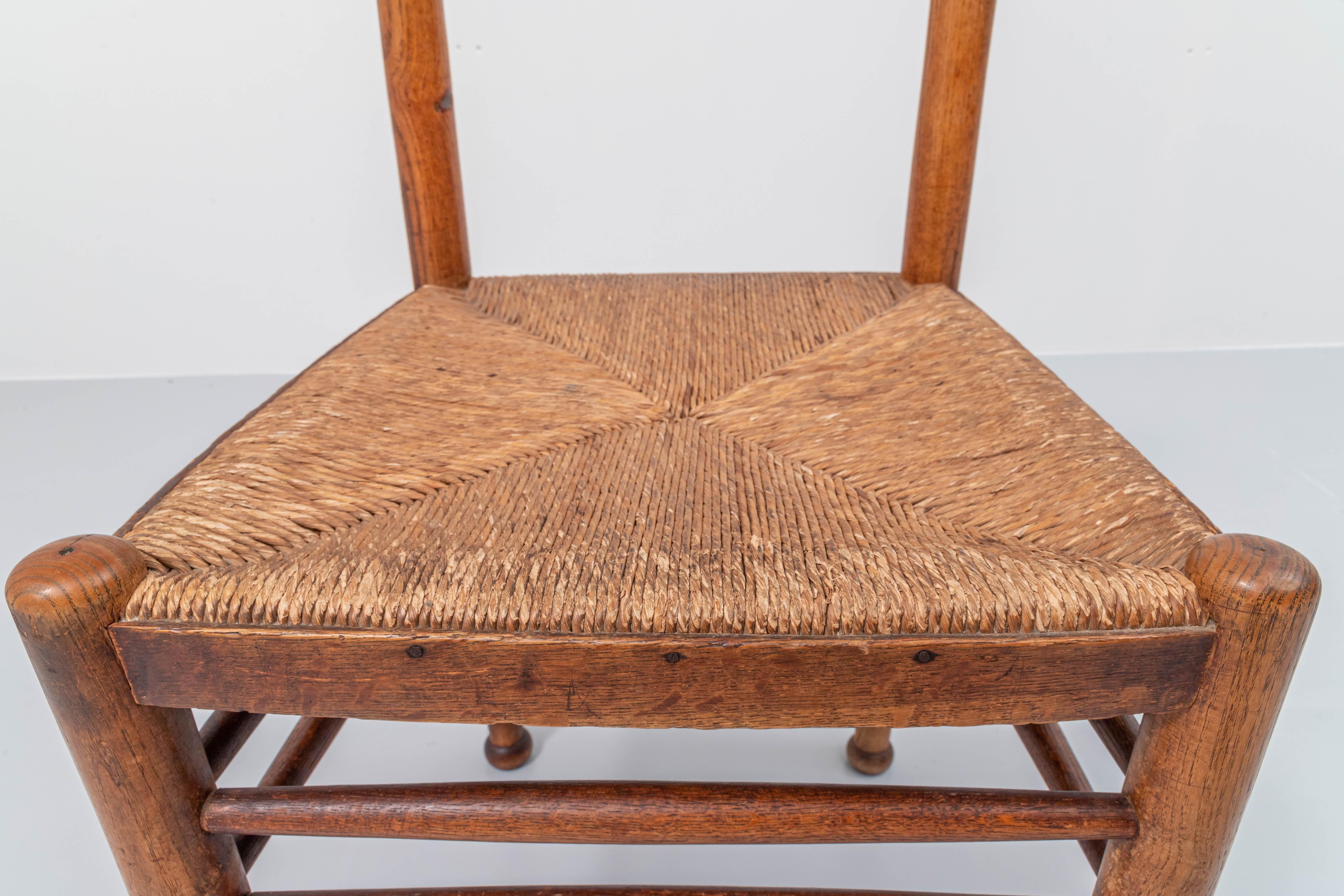 Mid-20th Century Dining chair in Oak and Cane, France, 1960’s For Sale