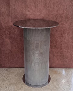 STOL - polished stainless steel side table by Candas Design