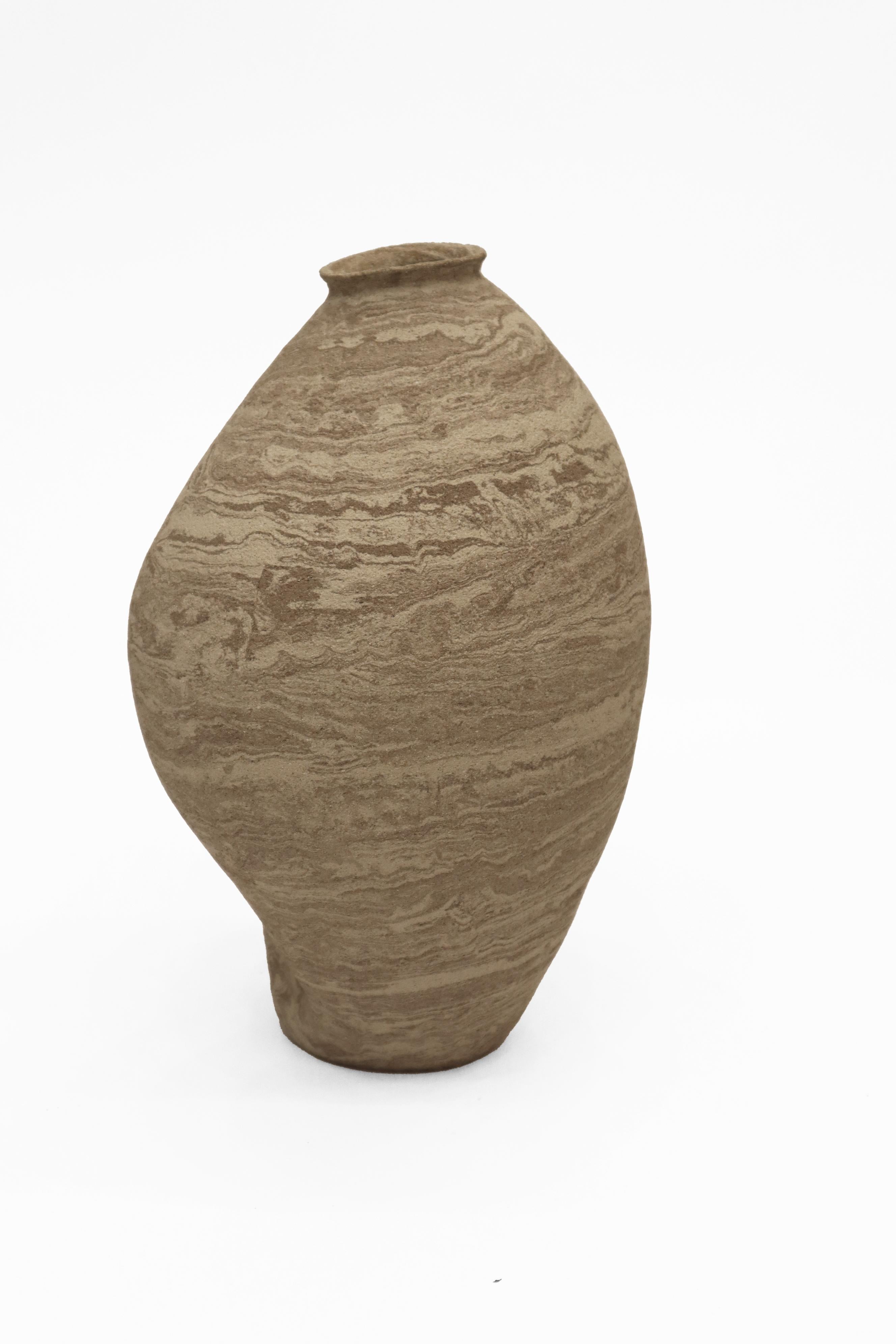 Stomata 10 vase by Anna Karountzou
Dimensions: W 17 x D 14 x H 30 cm
Materials: Mixed beige and white stoneware clay, clear glaze inside, fired at 1240

Born and based in Athens, Greece, with a background in conservation of works of art and