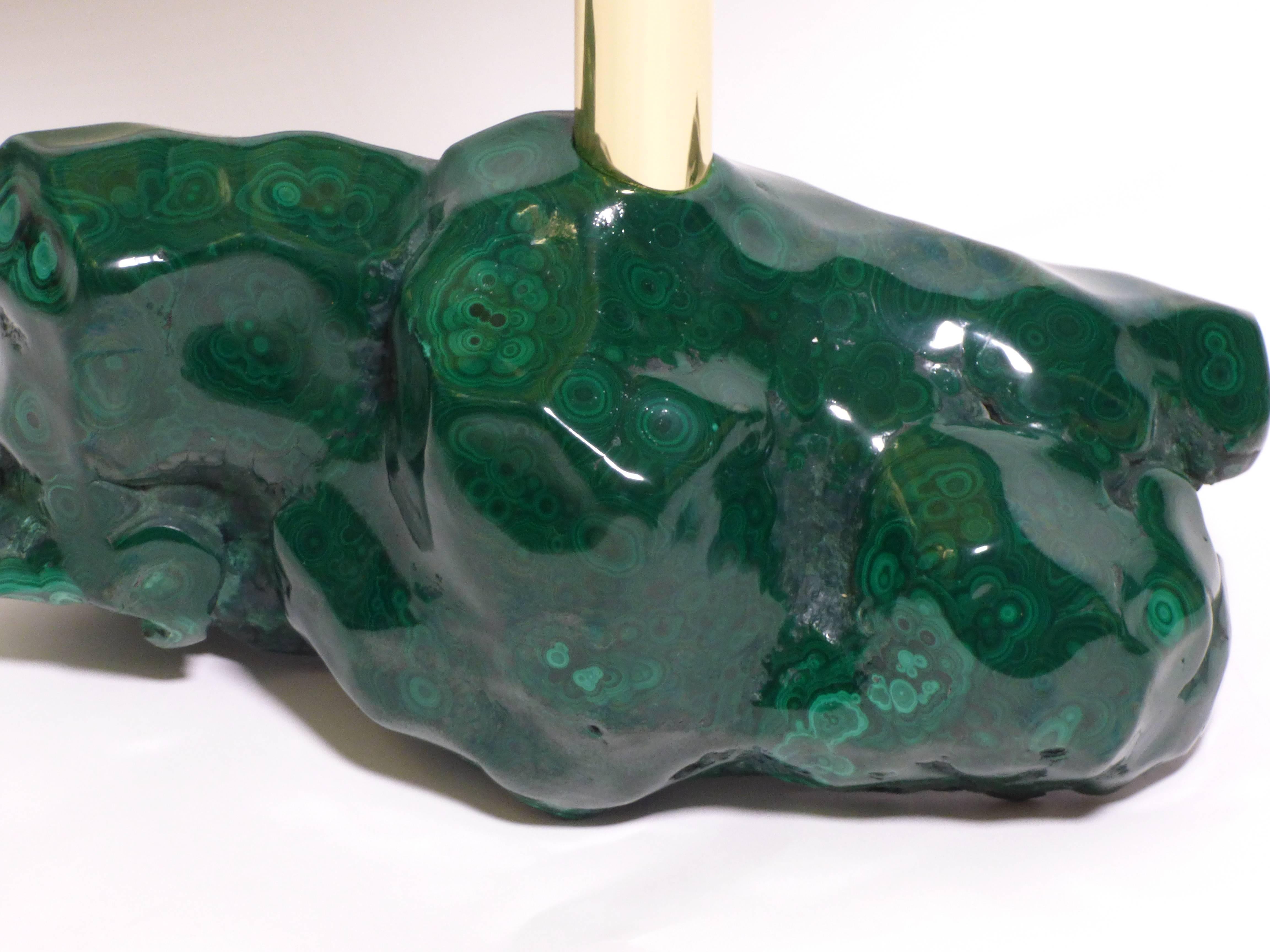 Stone Age gueridon with brass structure and base in semi-precious stone Malachite designed by Studio Superego for Superego Editions.

Biography
Superego editions was born in 2006, performing a constant activity of research in decorative arts by