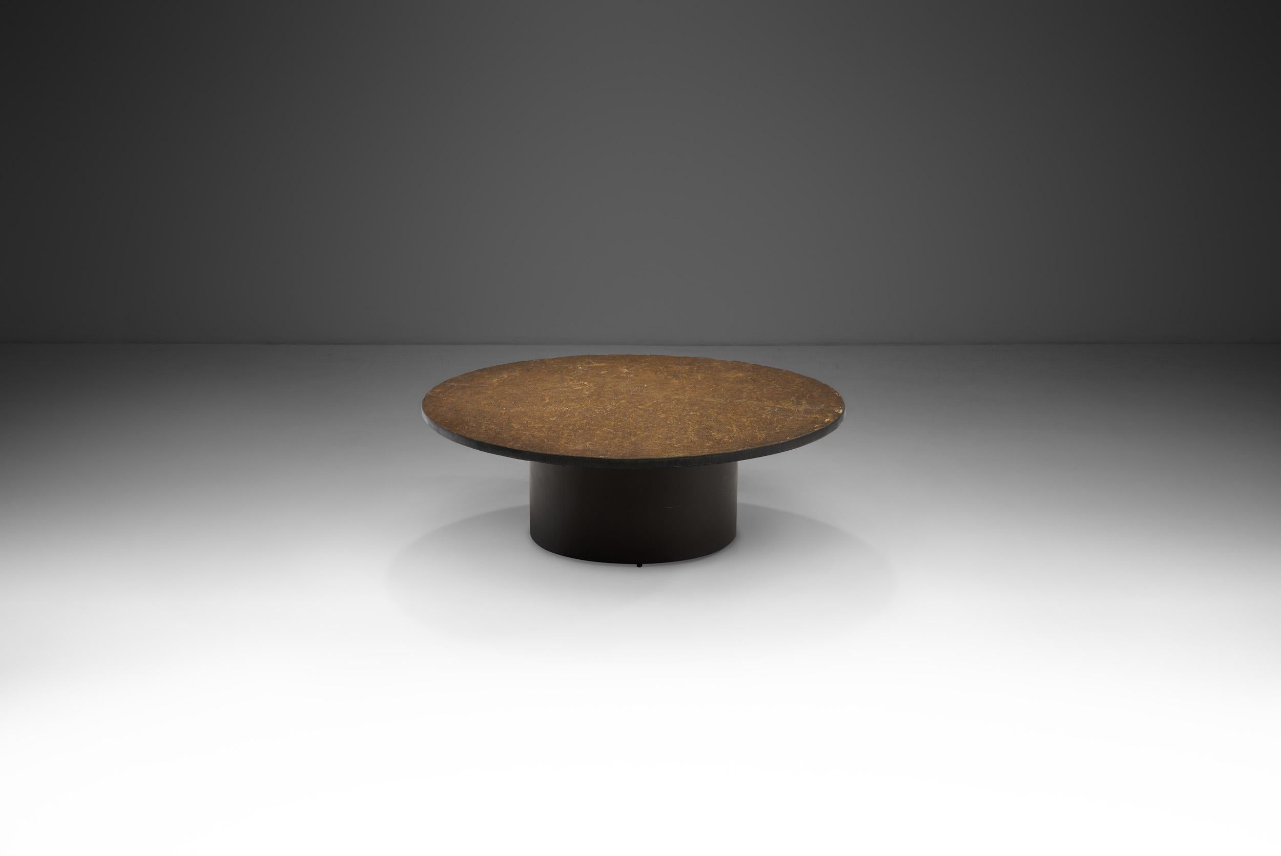 Among many other innovations, the Mid-Century Modern movement brought new materials and shapes into existence. Utilizing the natural qualities of stone and combining it with the expertise of its master craftsman, this coffee table is a unique piece
