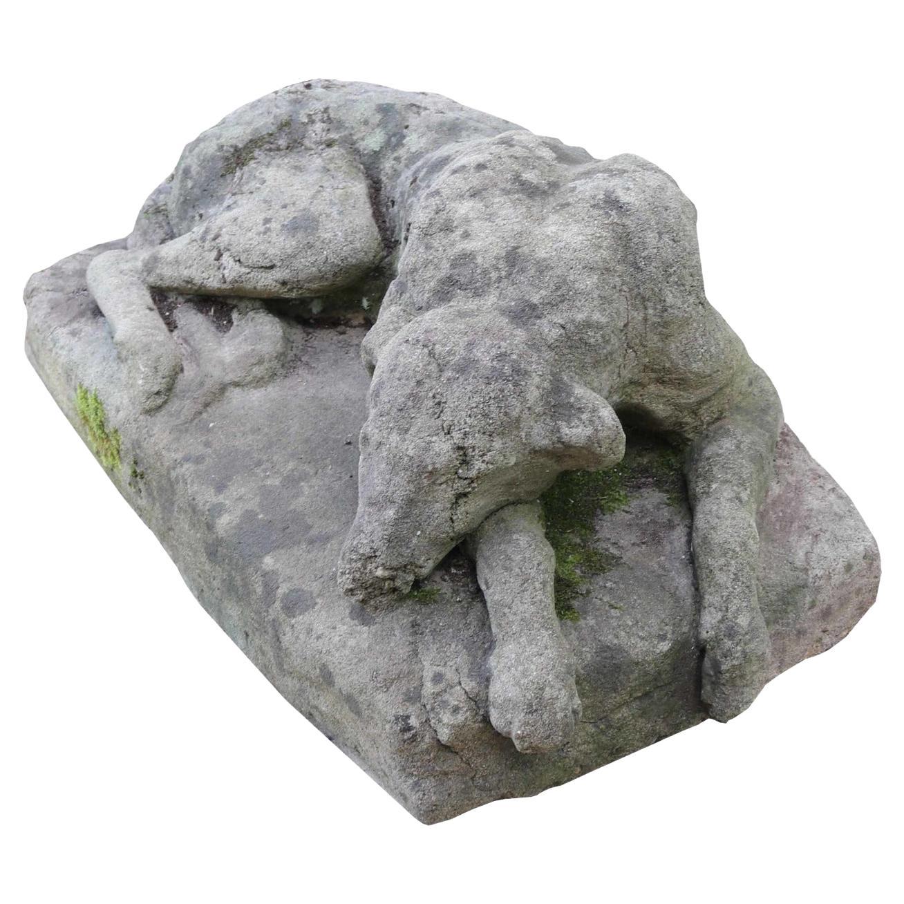 A Stone Antique Resting Greyhound Statue