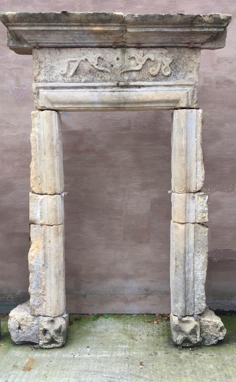 French early 18th century sandstone doorway. Moulded troughout with starshaped bases and a dated frieze, 1715.
Interior dimensions are 201 H x 93 W or 79.13 x 36.6 inches W.
Exterior dimensions are 266 H x 132 W or 104.7 x 52 (without siderocks to
