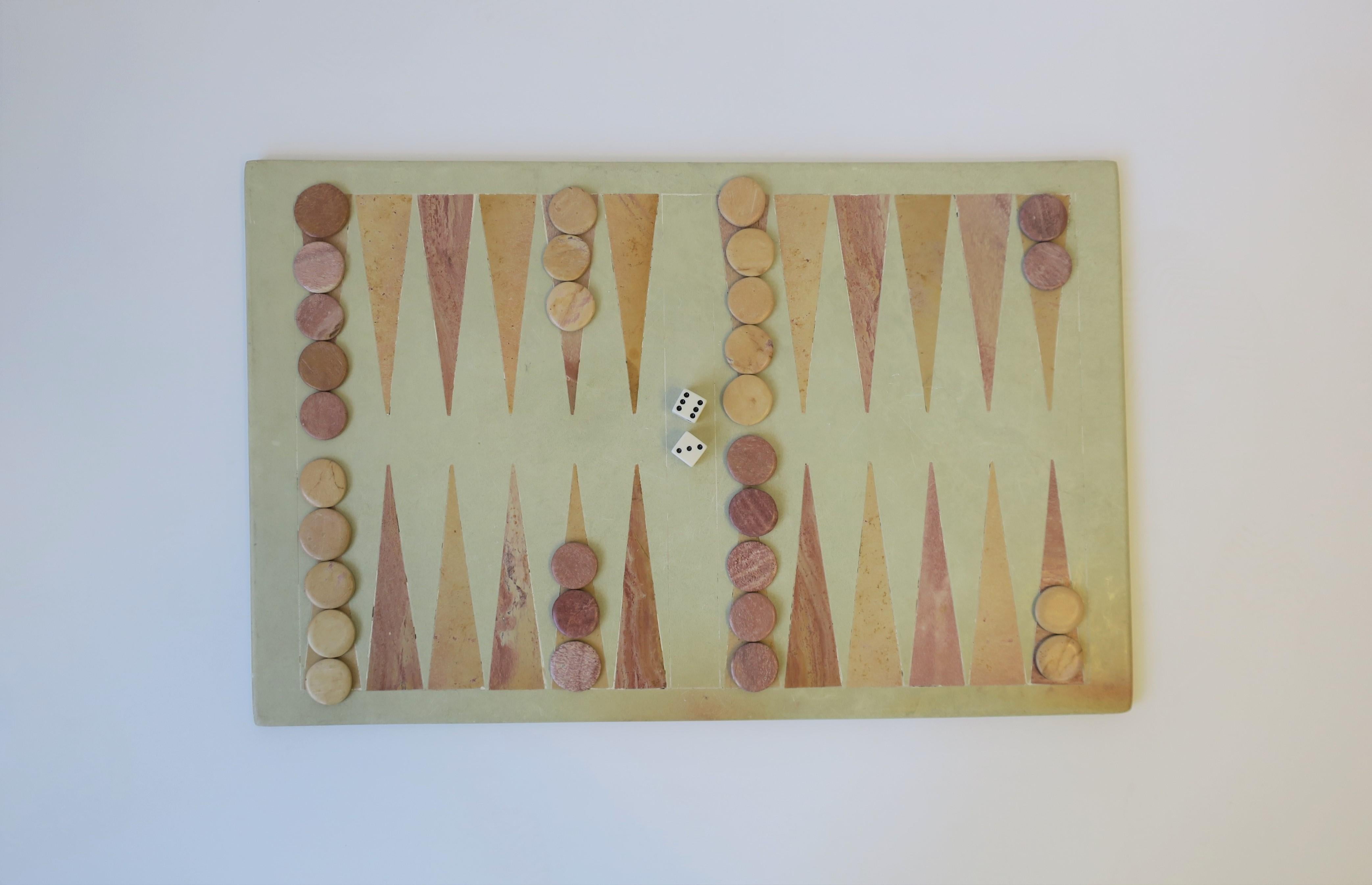 A vintage Minimalist style stone backgammon game set, circa late 20th century. 

Board measures: 7.88