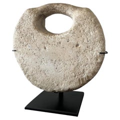 Ídolo de disco bactriano de piedra