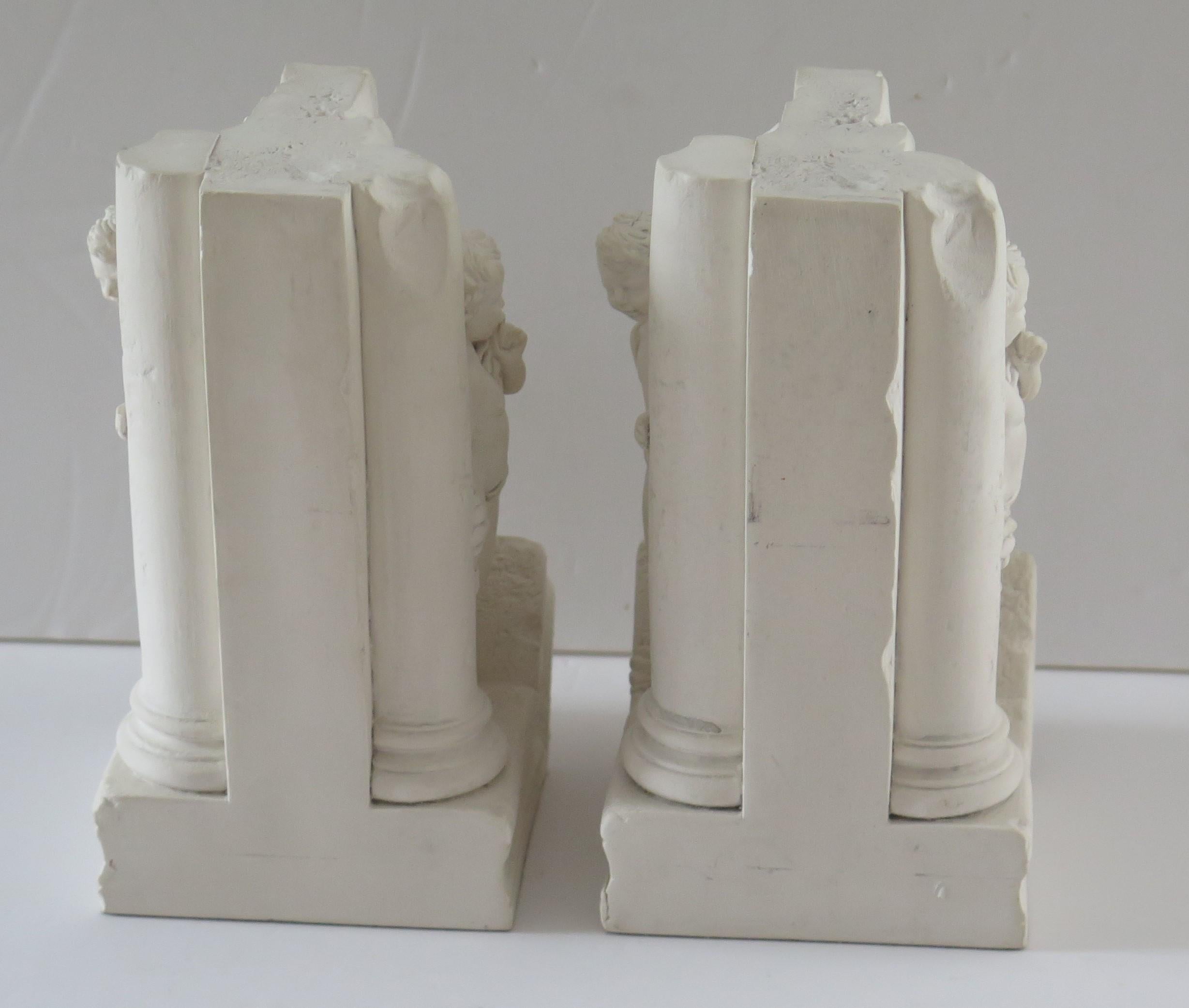 Neoclassical Revival Stone Bookends Hide & Seek Cherubs by Revival Art Company, 20th Century