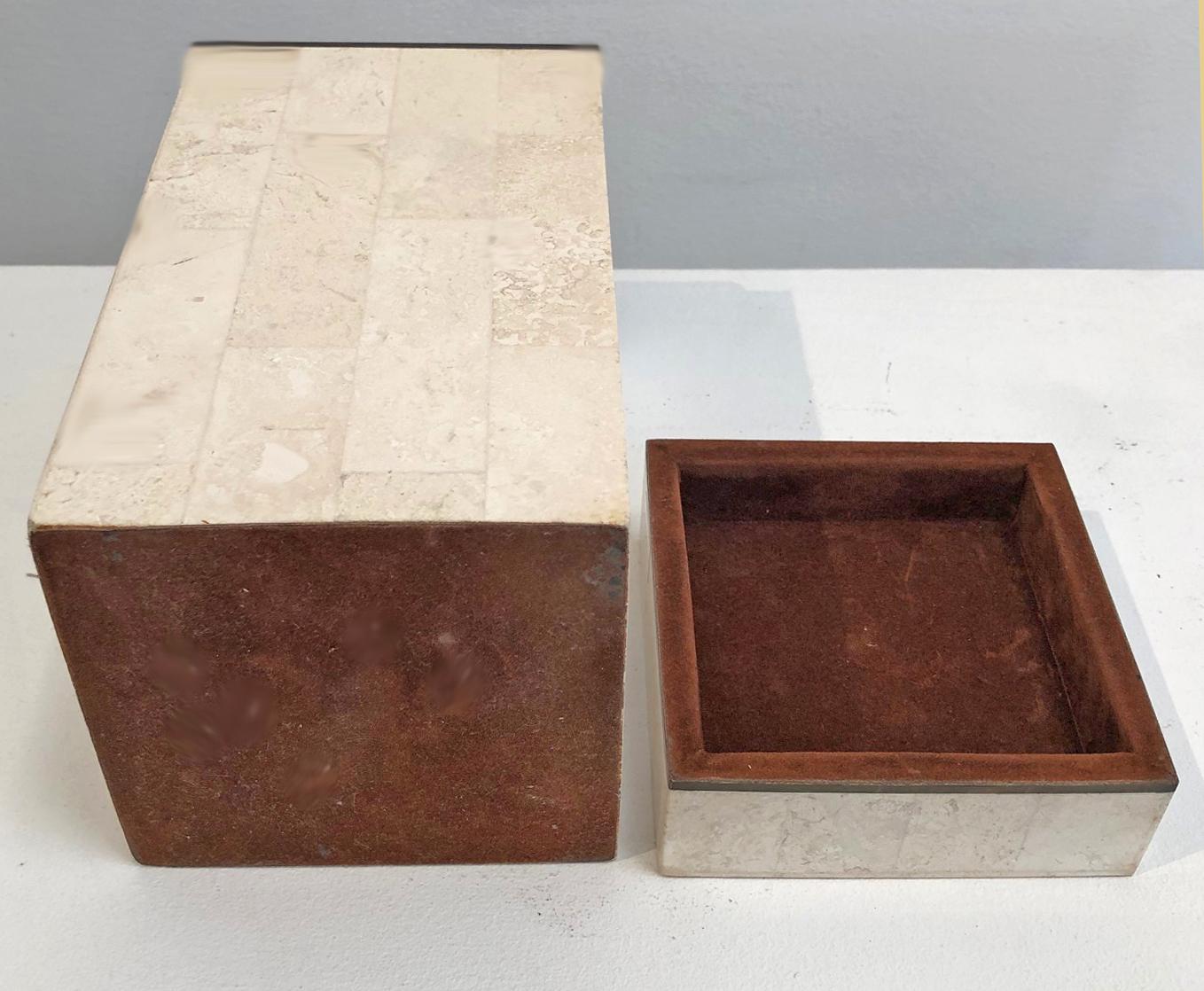 Tessellated stone box made by Maitland Smith. Travertine exterior with felt limed interior. Perfect as a desk accessory or pencil holder.

Complementary delivery in the Los Angeles / Beverly Hills area. Pick up is also an option.