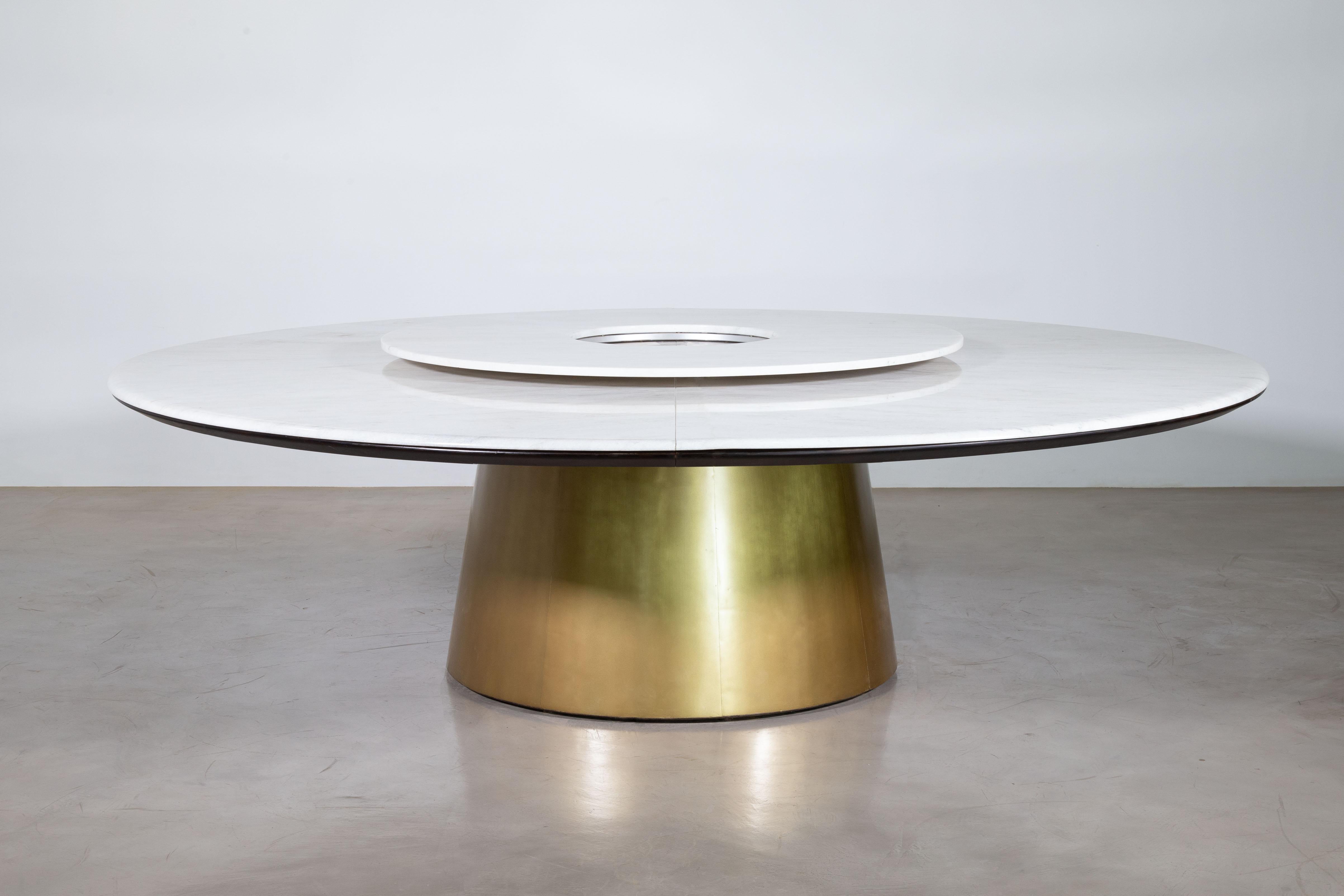 This White Ibiza Marble Table with wood and wrapped Bronze base and a rotating server by Costantini is in stock and available for immediate delivery.  

Measures 108