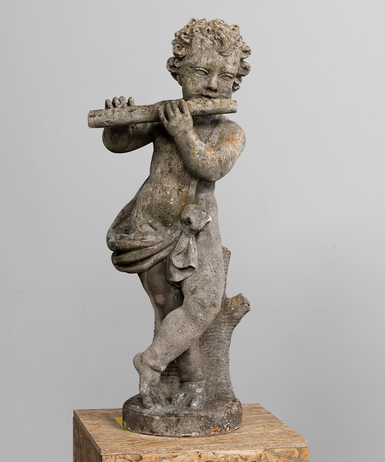 Cast stone garden statue of cherub with flute. Wonderful patina.
 